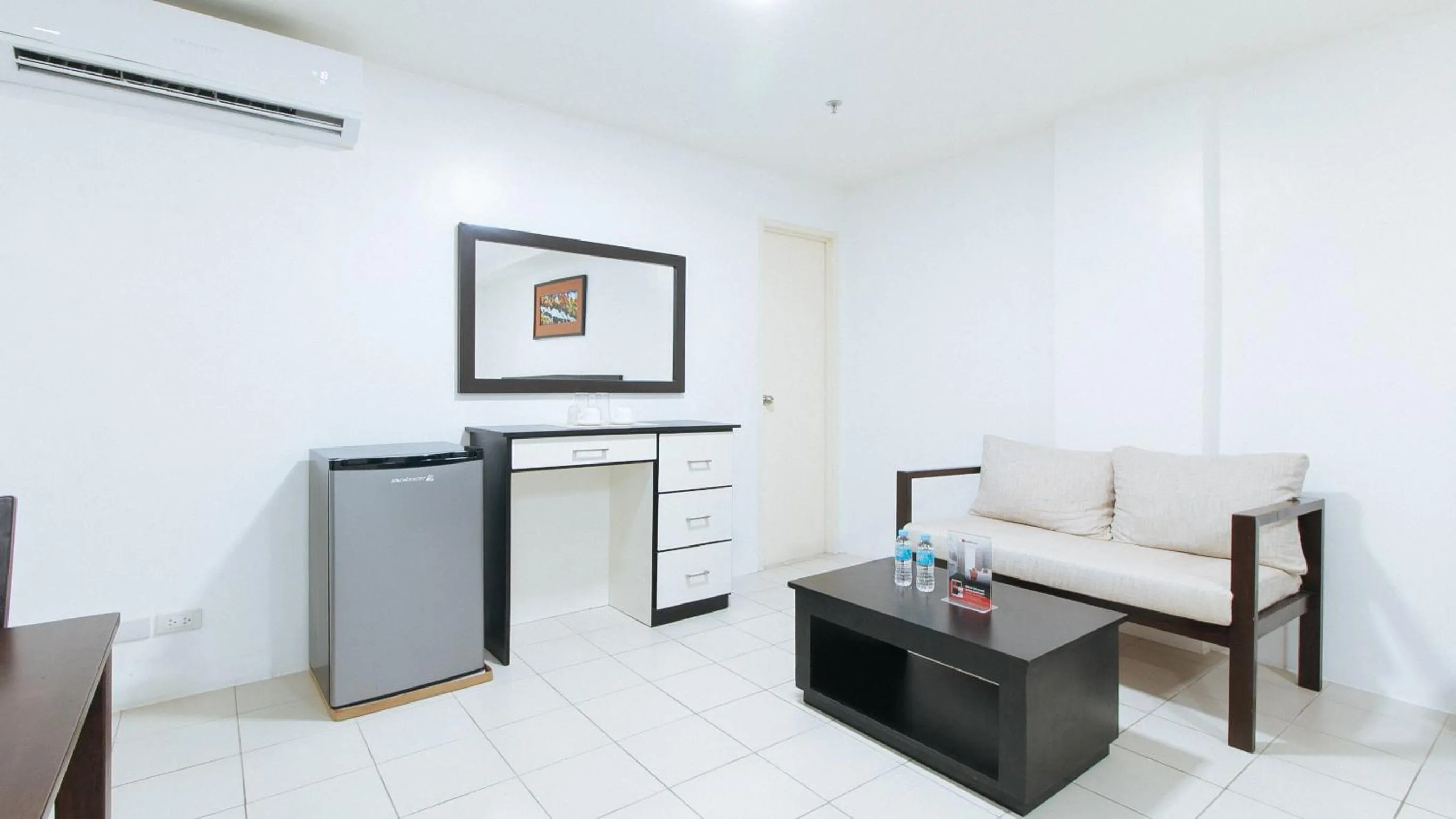 Living room in RedDoorz Plus at Evangelista Street Makati