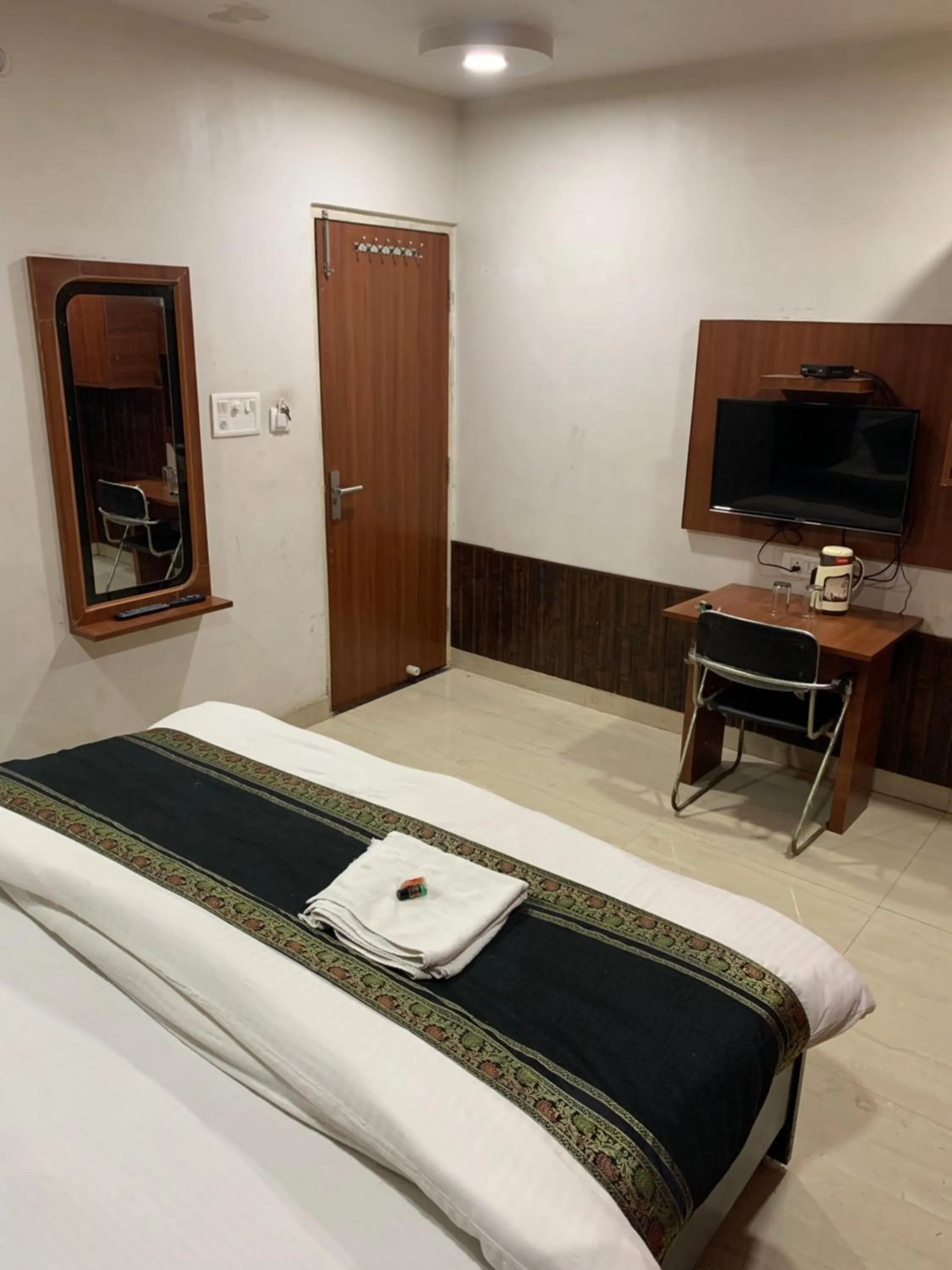 Bed in Hotel Ashoka Ganages