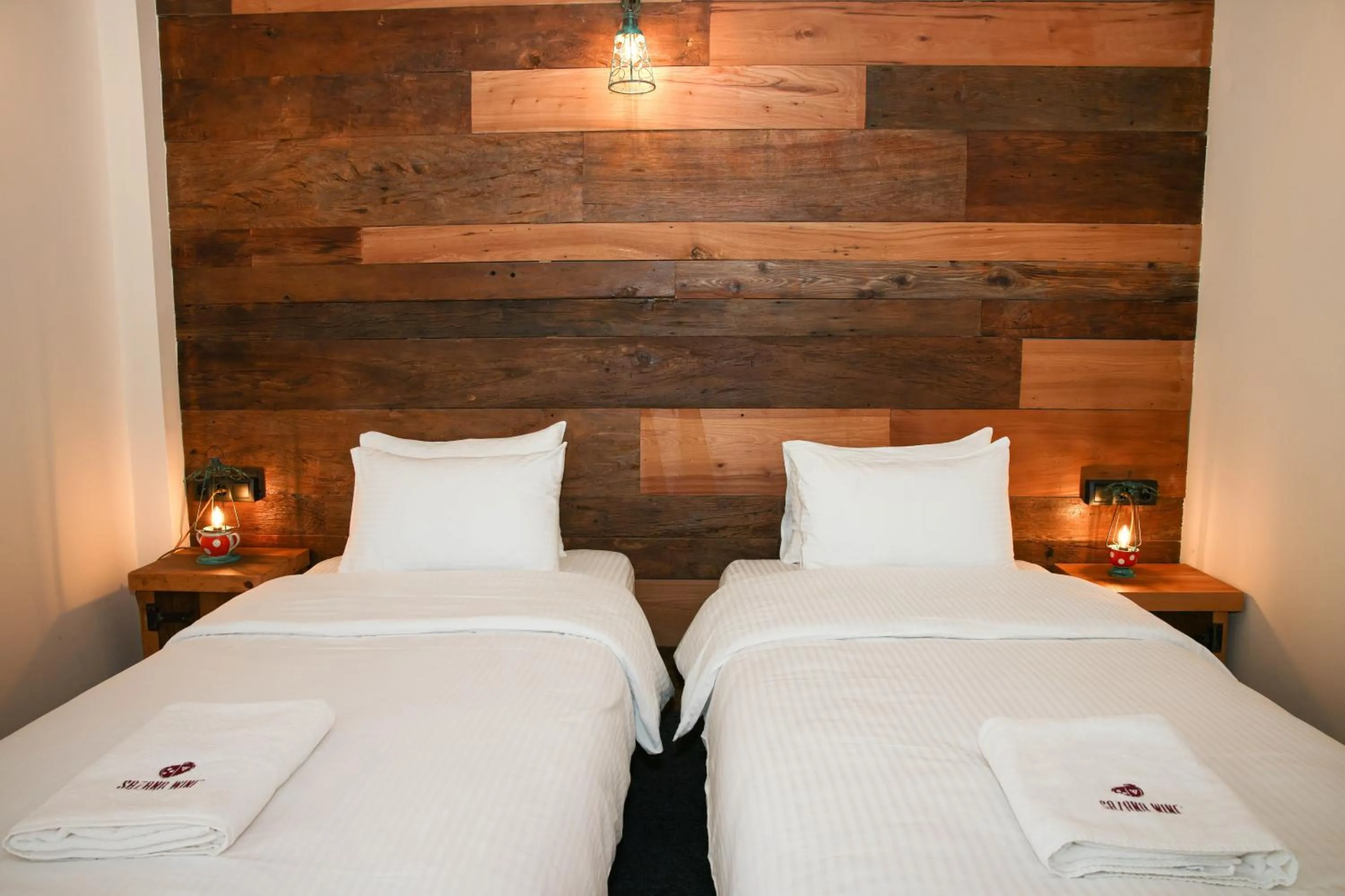 Bed in Ethno Sazano Hotel