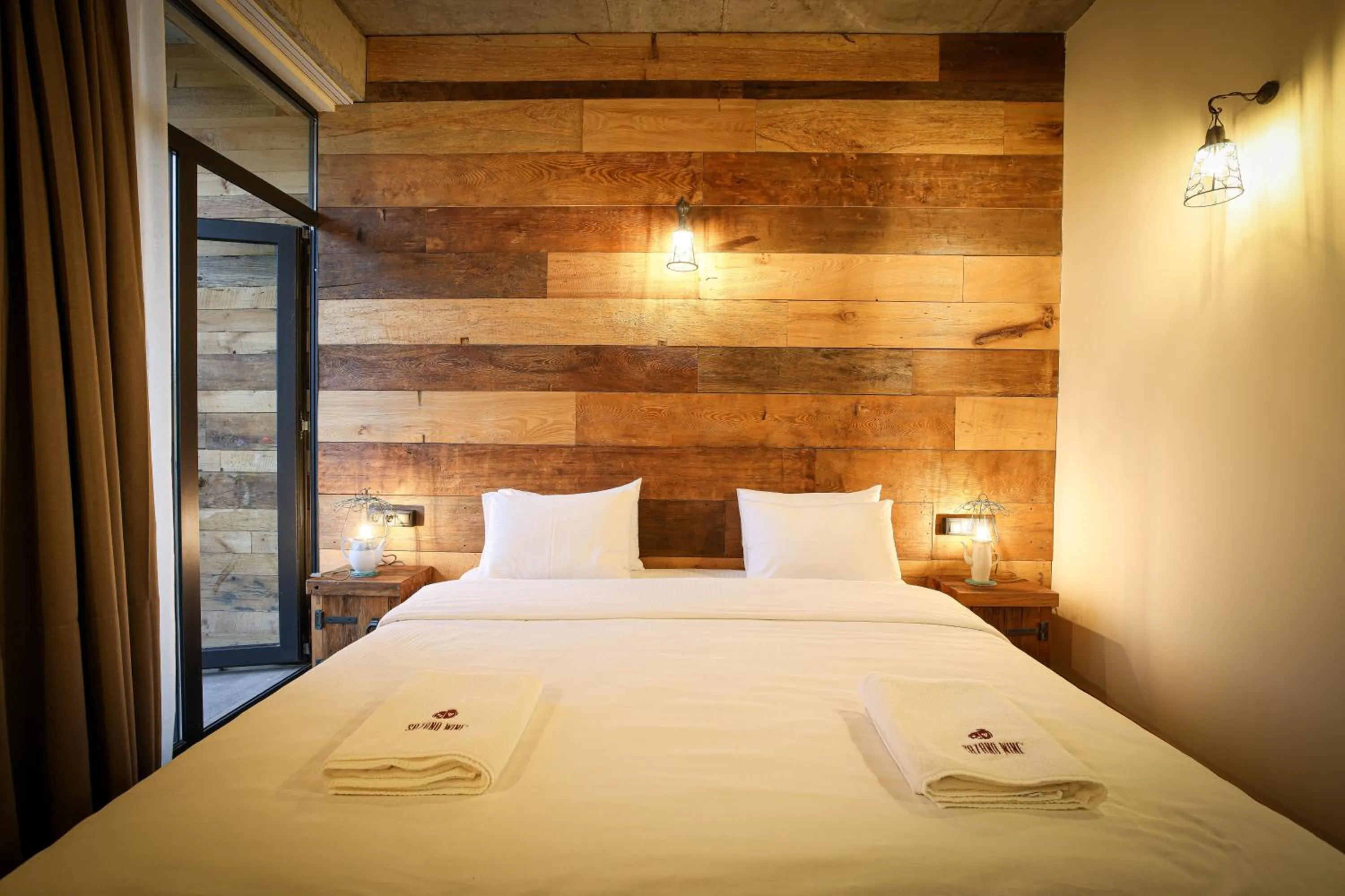 Bed in Ethno Sazano Hotel