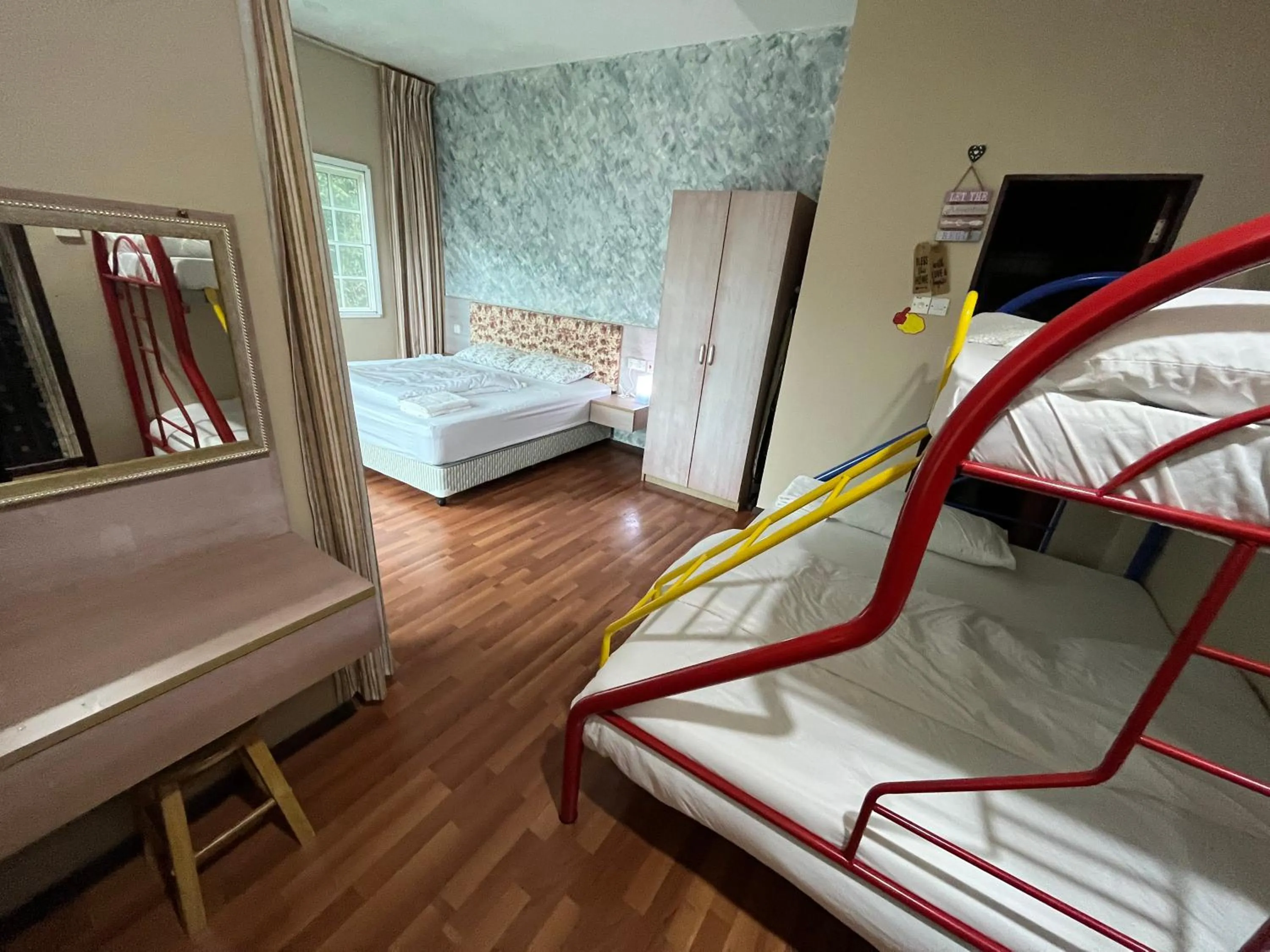 Bed in EagleNest at Iris House Resort