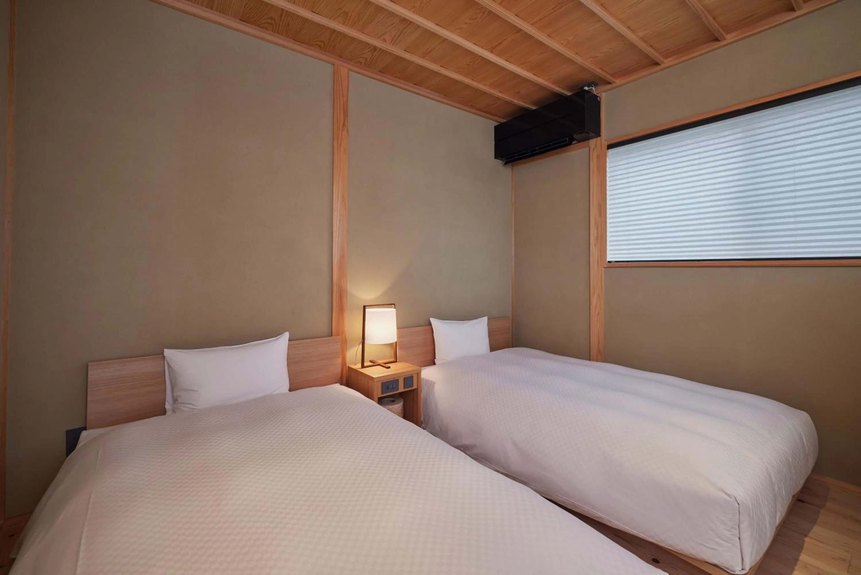 Bed in HOTEL CULTIA DAZAIFU