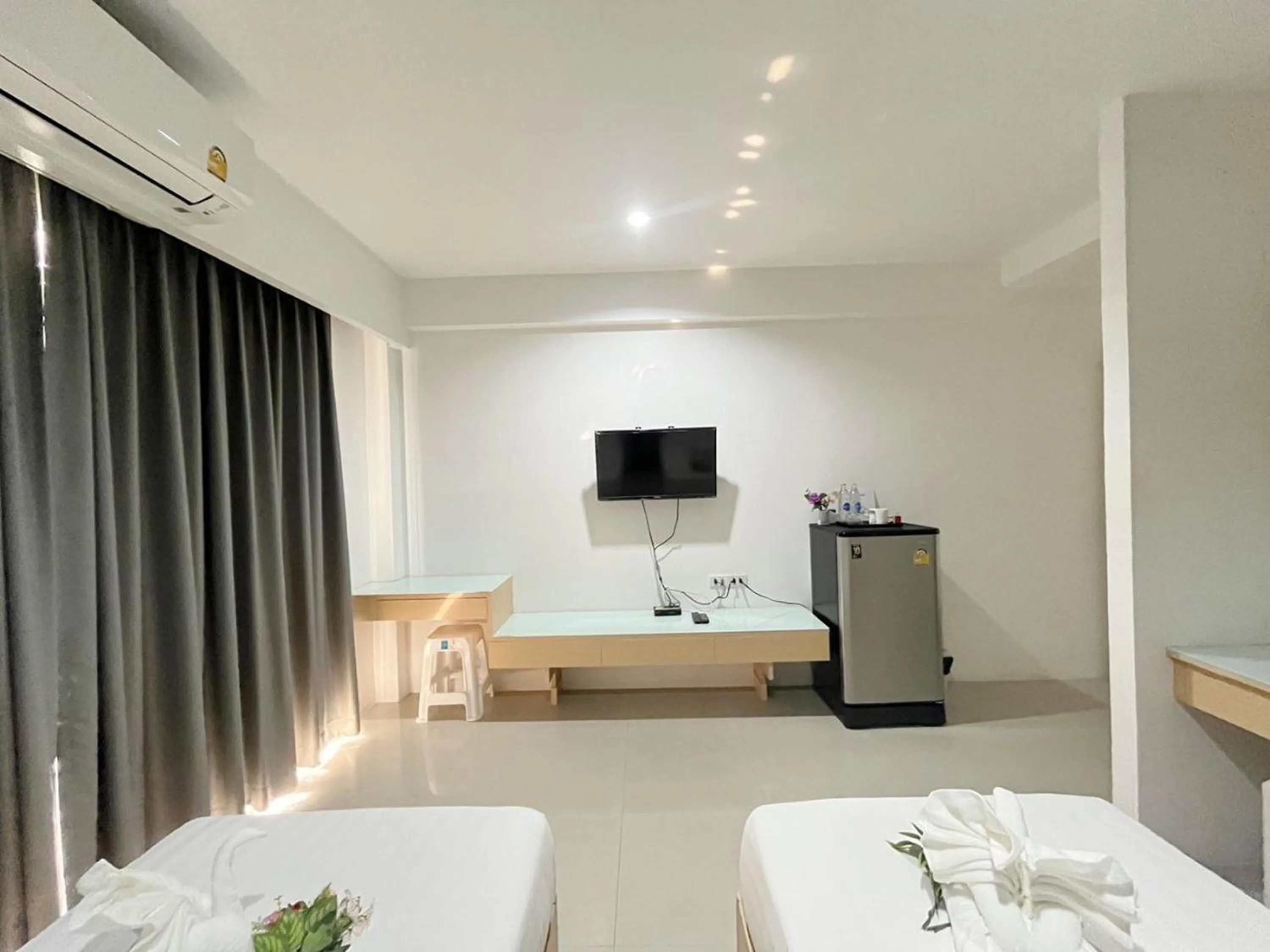 Bed in Ruan Plaisoi Apartment