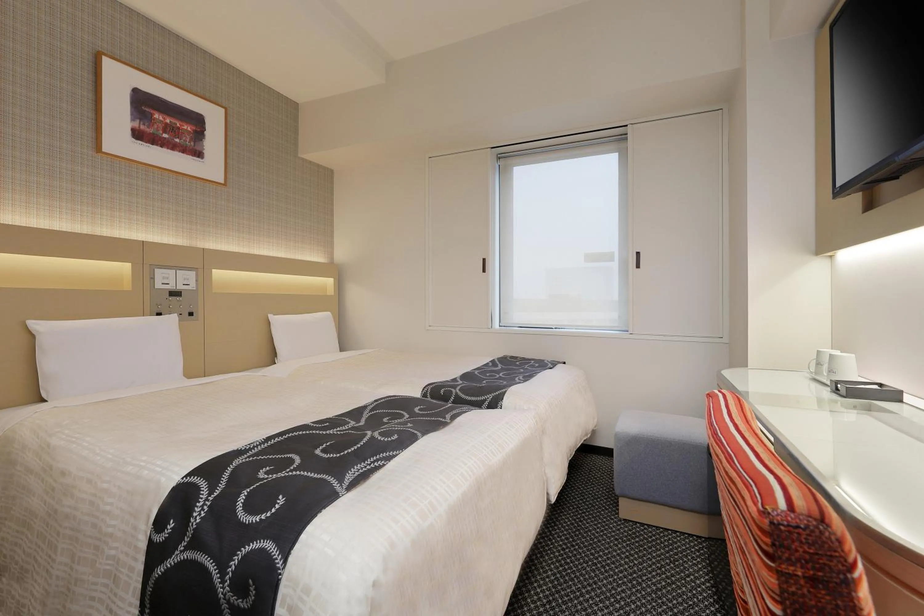 Bed in Keio Presso Inn Nihonbashi Kayabacho