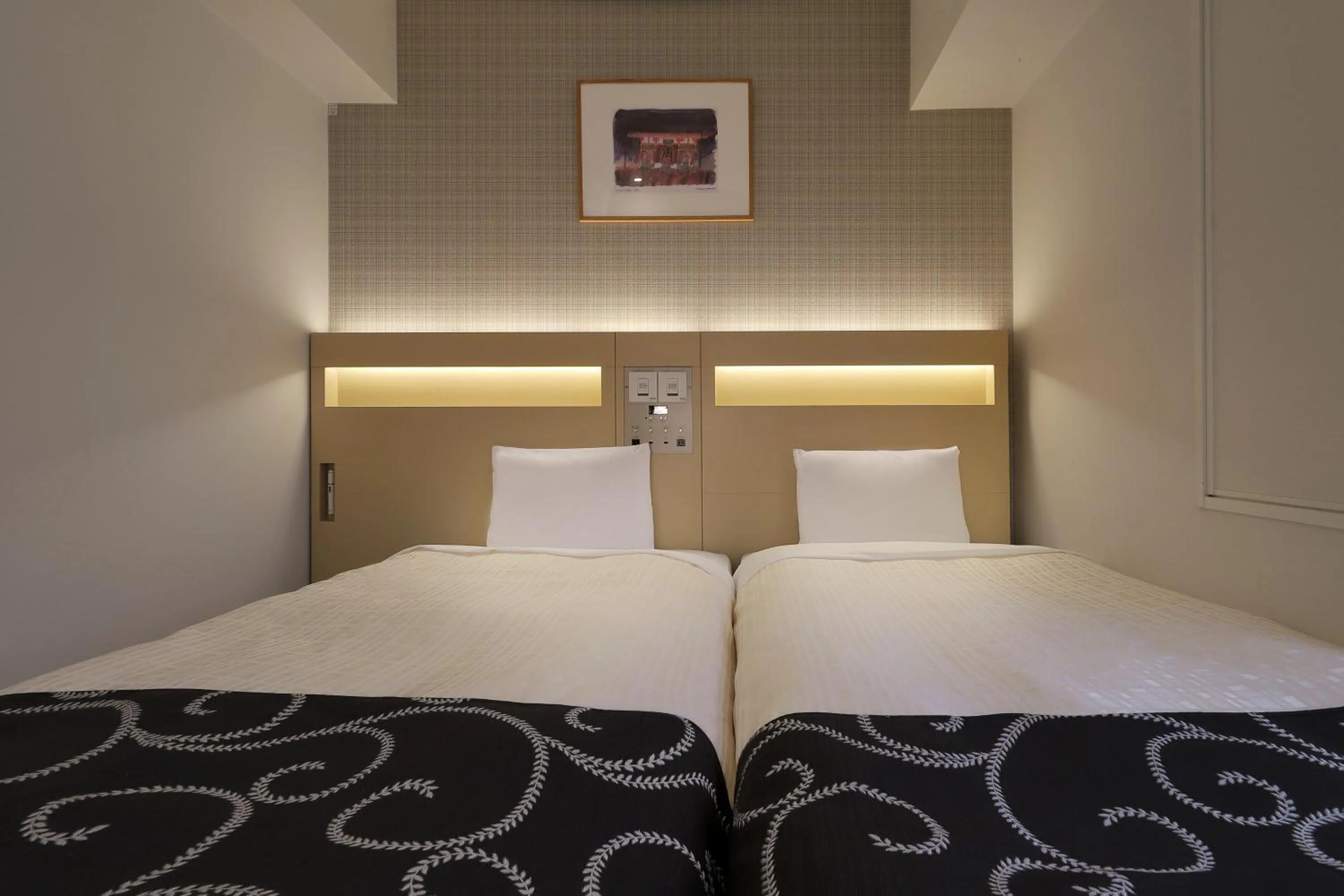 Bed in Keio Presso Inn Nihonbashi Kayabacho