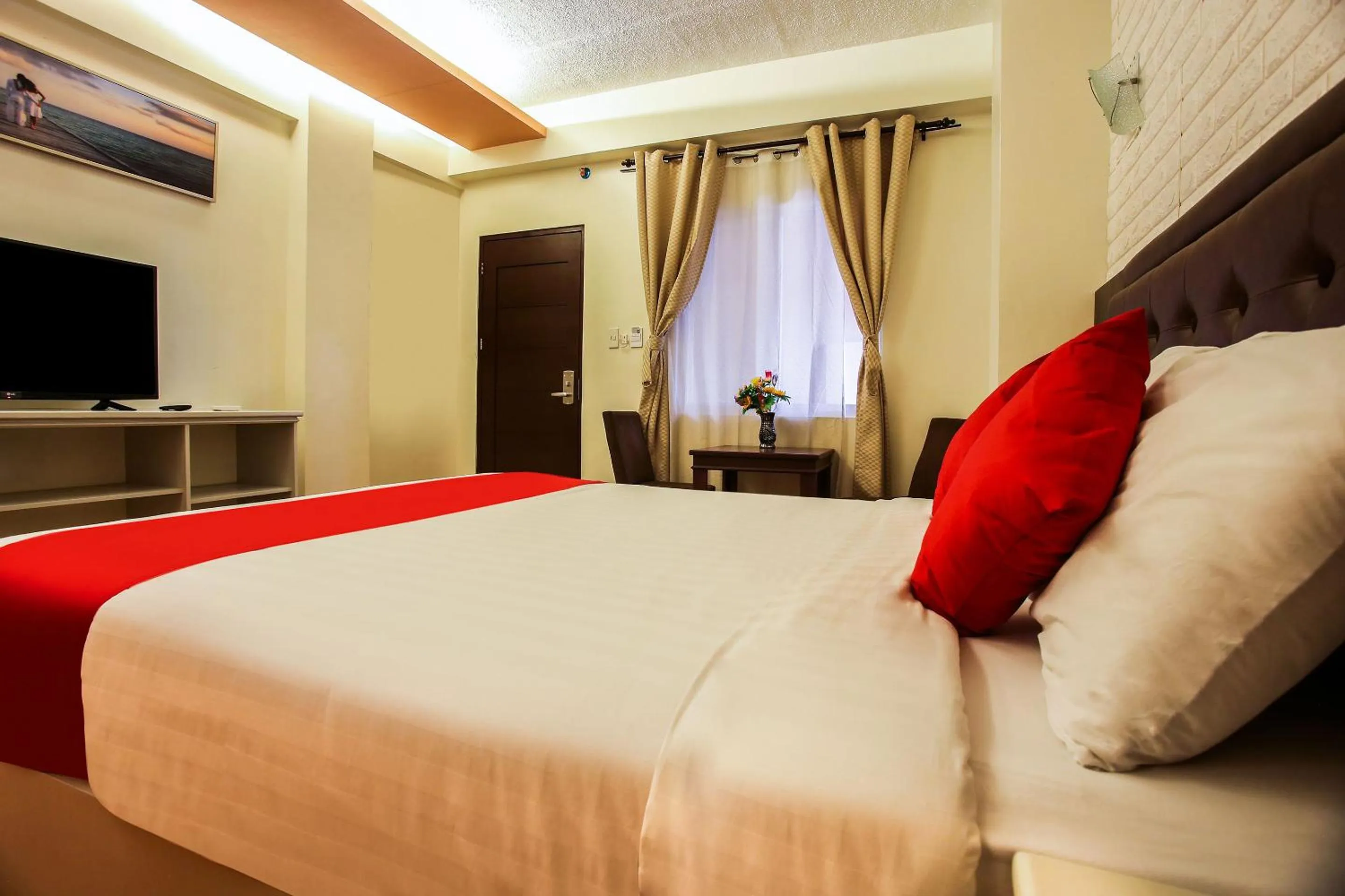 Photo of the whole room in Capital O 786 KWE Hotel and Resort.