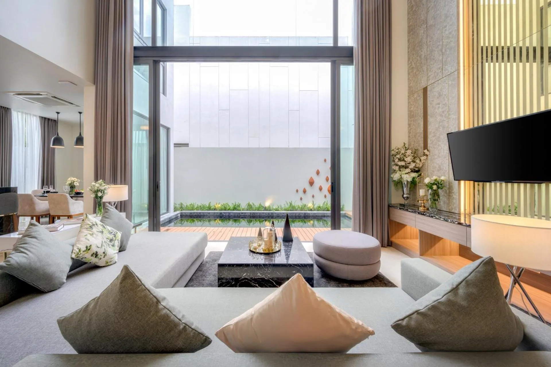 Living room in Mida Grande Resort Phuket Official Account