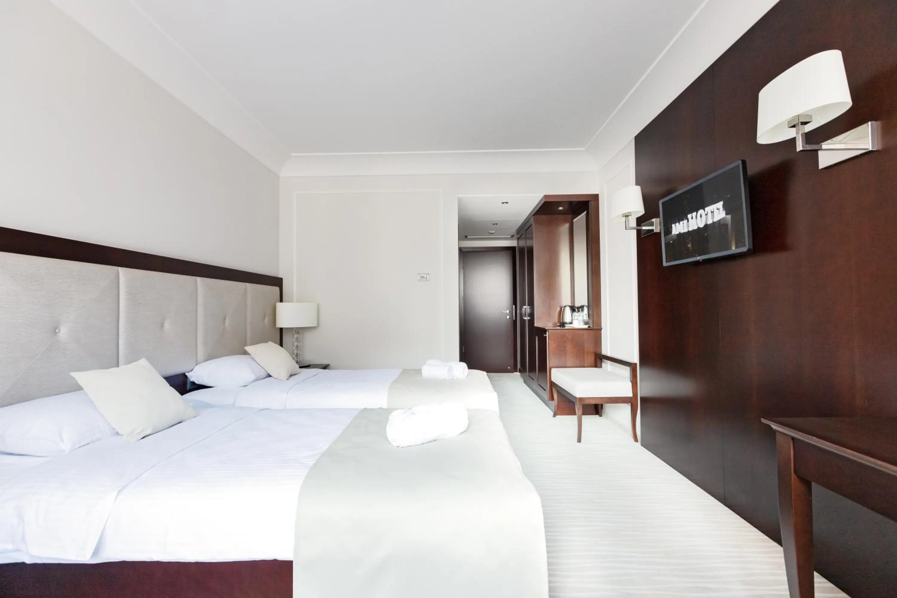 Bed in GARNI HOTEL AMI