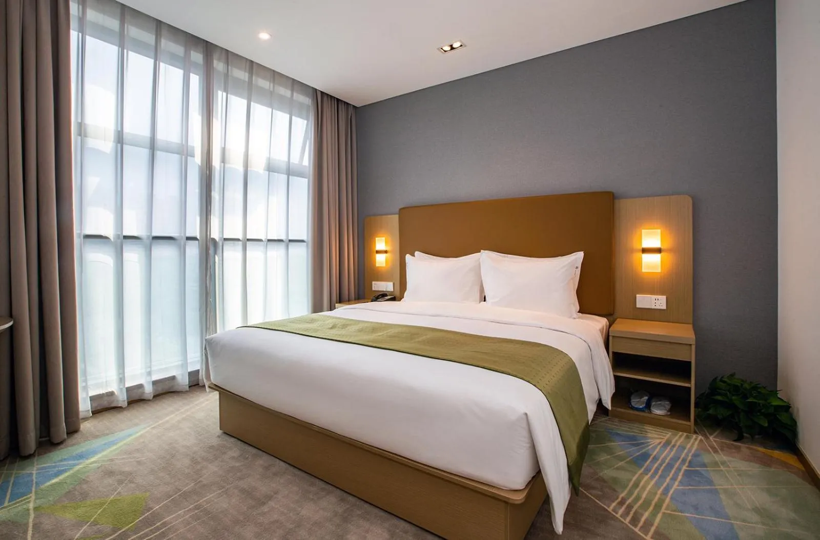 Bed in Holiday Inn Express Changzhou Xinbei by IHG