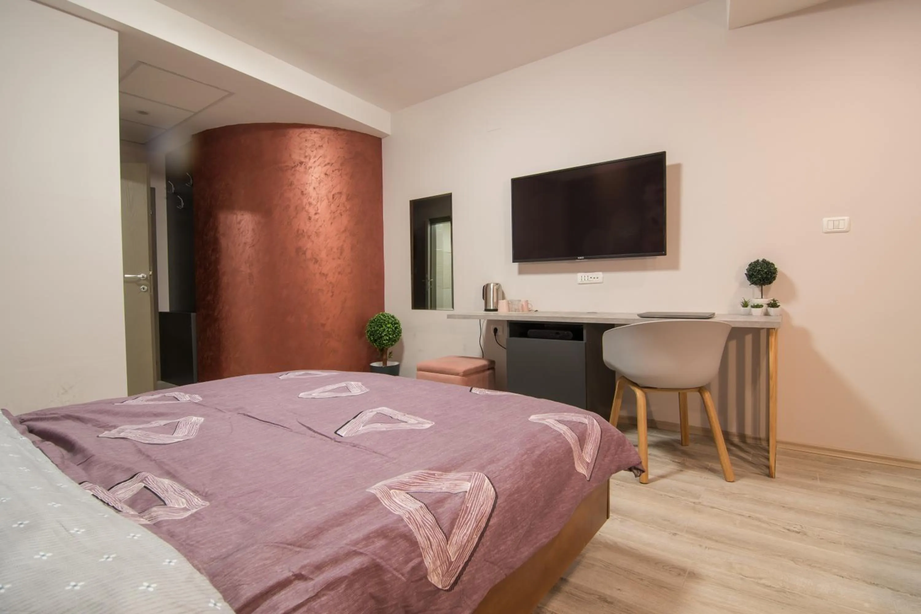 Communal lounge/ TV room, Bed in Vanilla Boutique Hotel