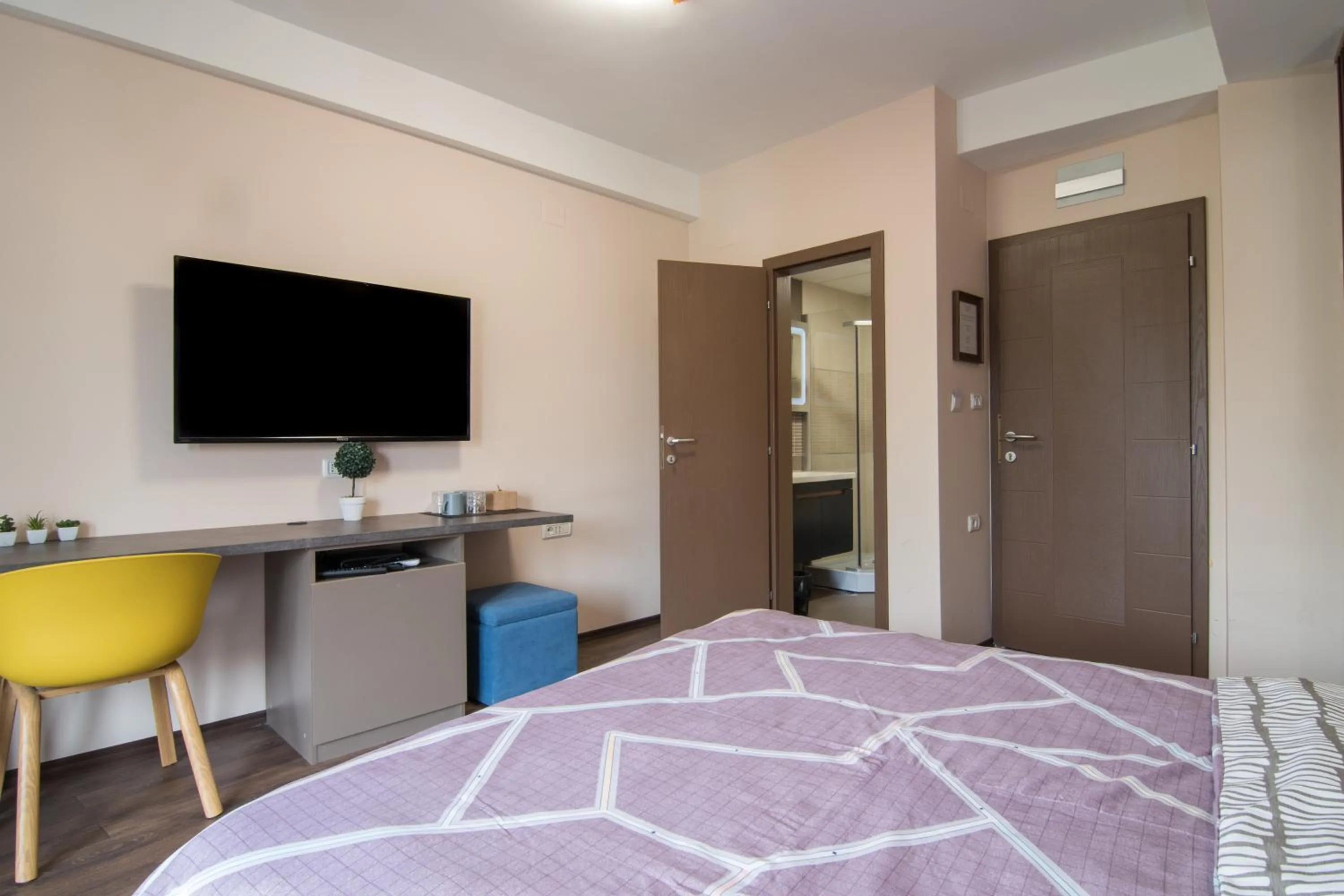 Communal lounge/ TV room, Bed in Vanilla Boutique Hotel