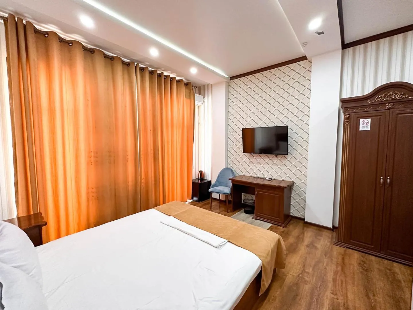 Bed in Hotel Khiva Palace