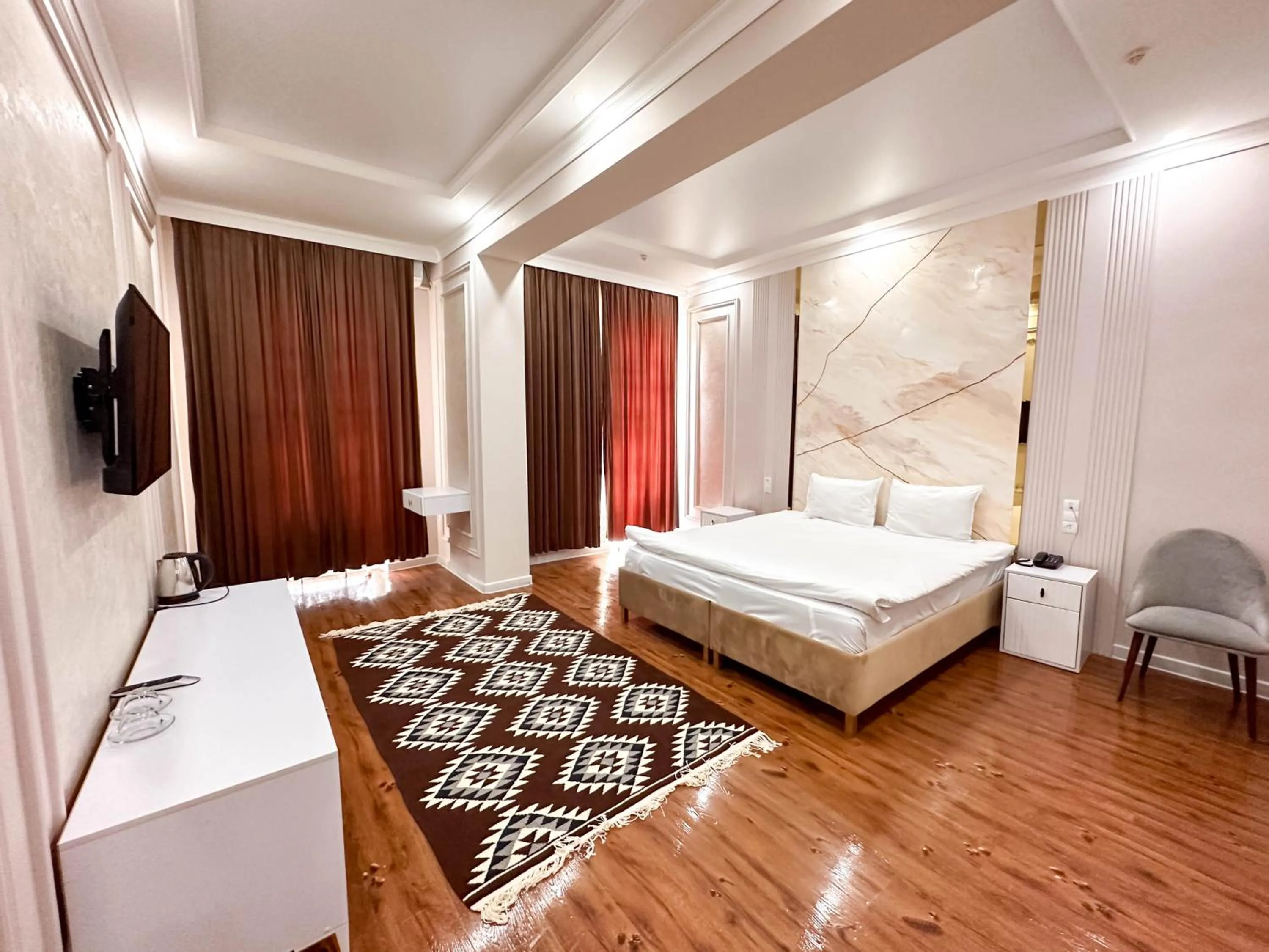 Bed in Hotel Khiva Palace