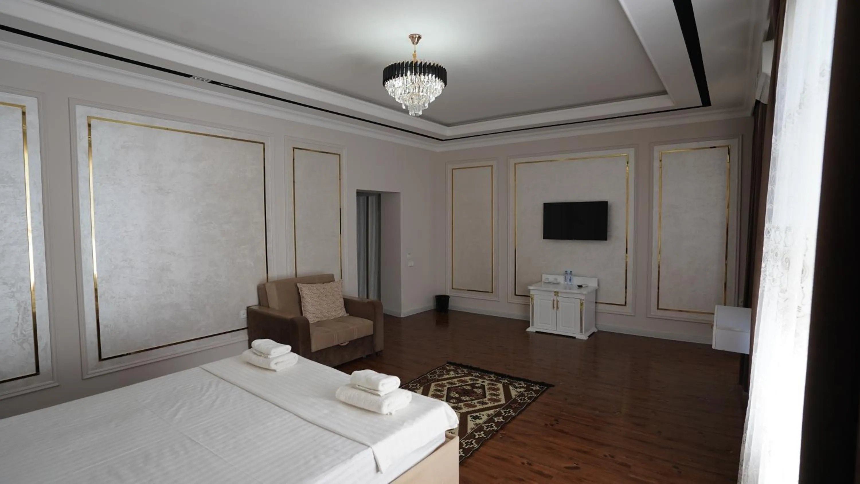 Bed in Hotel Khiva Palace