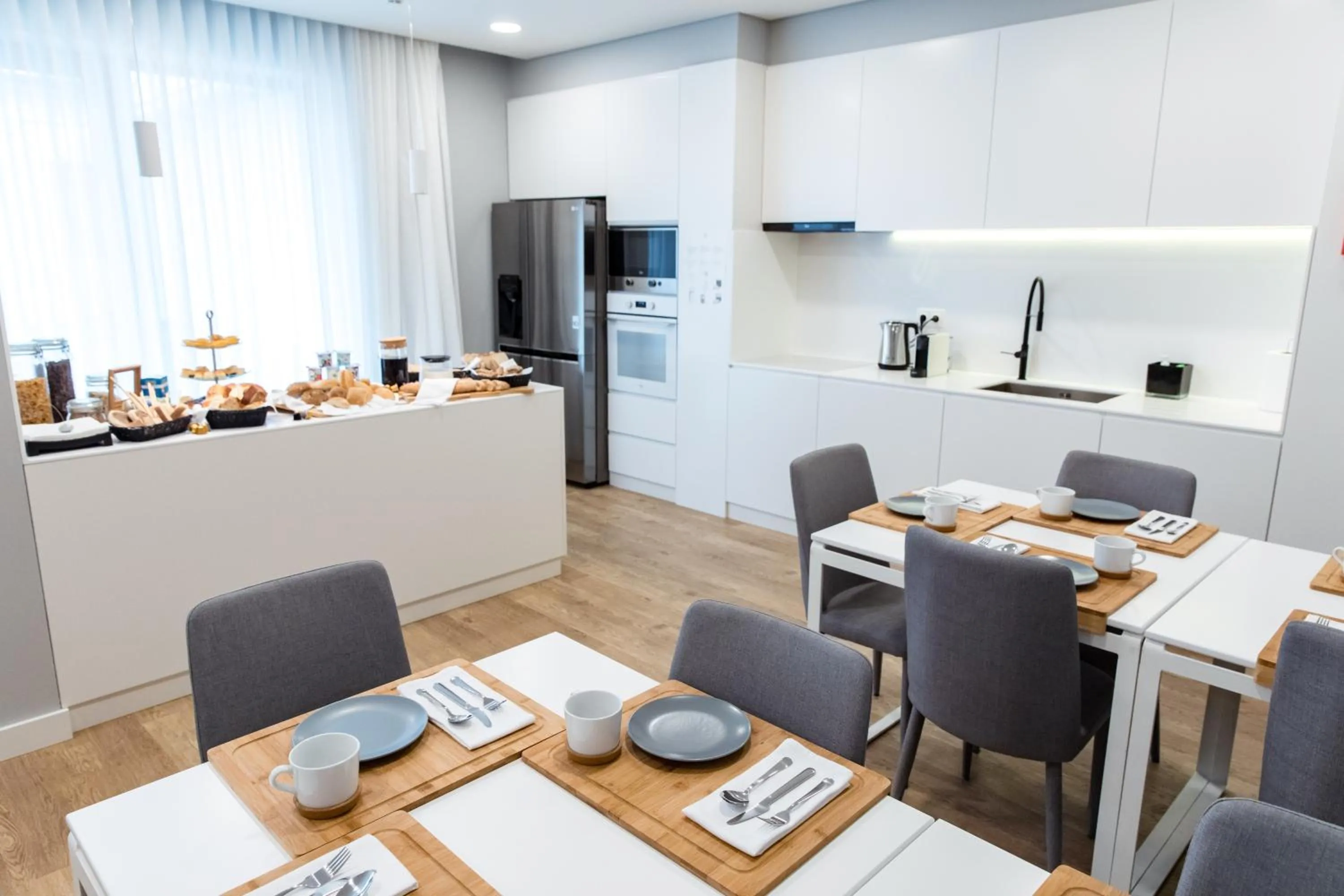 Kitchen or kitchenette in Ilha Hostel & Suites