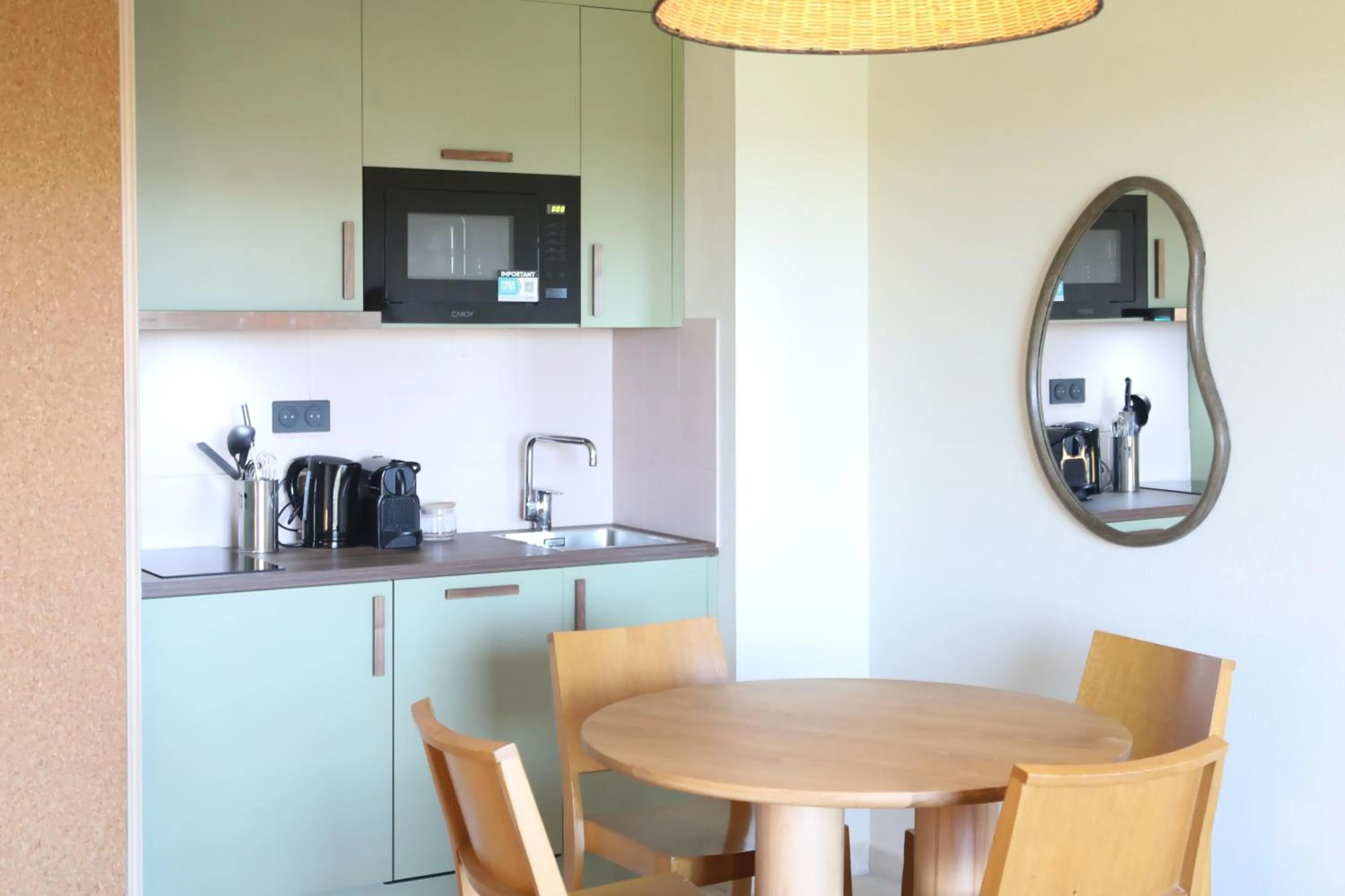 Kitchen or kitchenette in Hôtel Golf Fontcaude