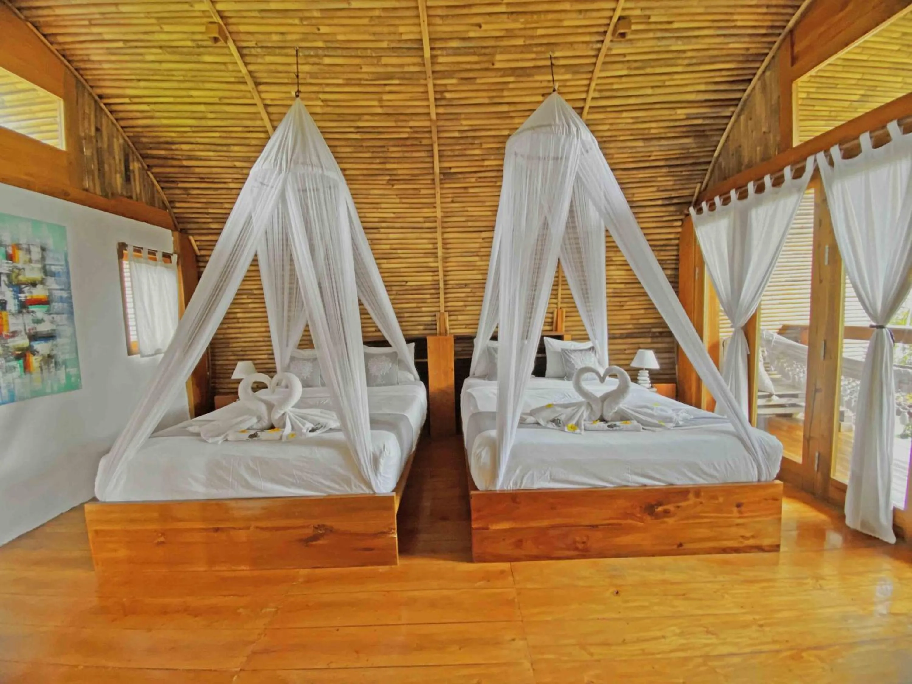 Bedroom, Bed in Lagoona Beach Bungalows - Eco Bungalows Batukaras