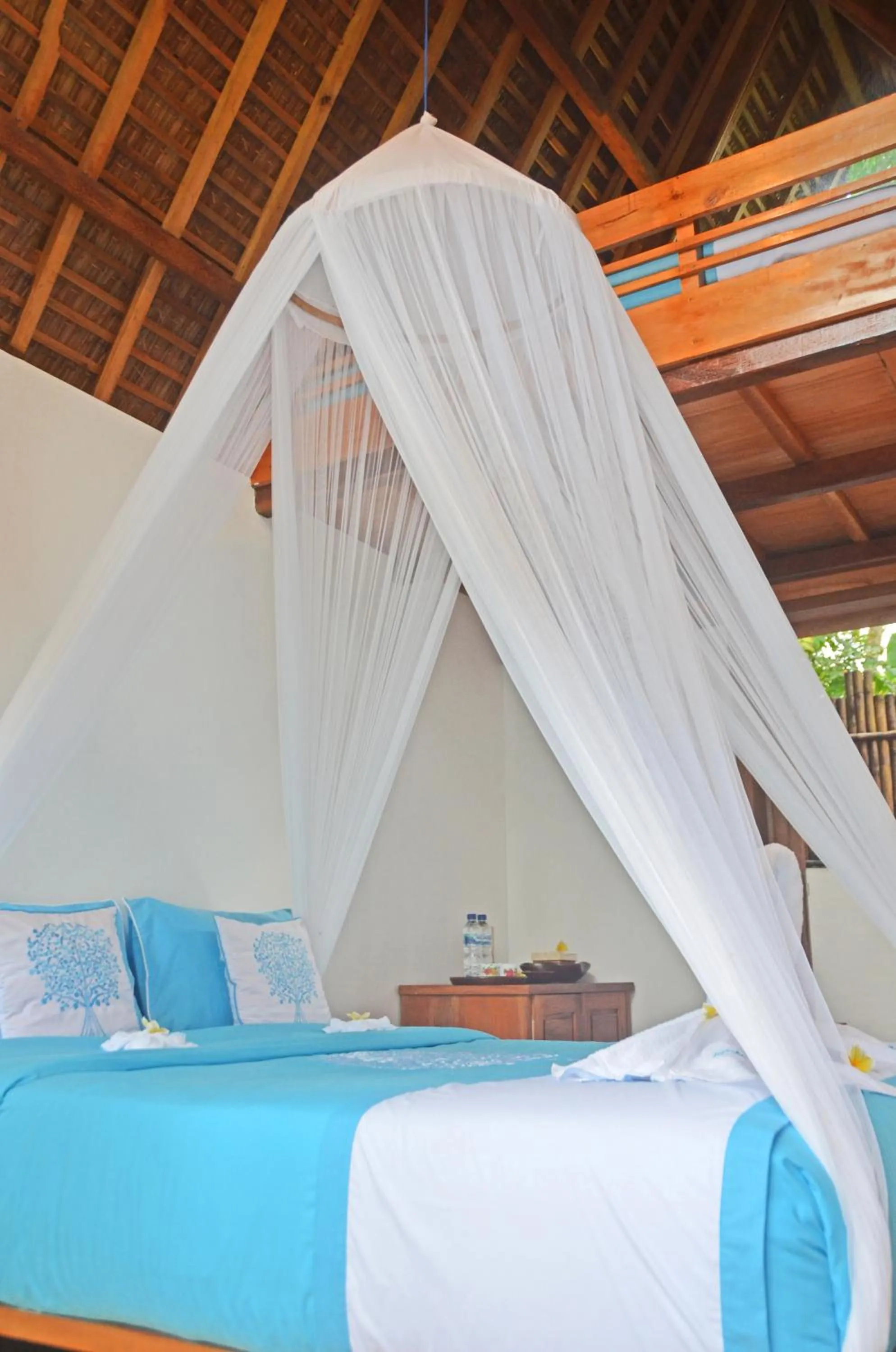 Bed in Lagoona Beach Bungalows - Eco Bungalows Batukaras