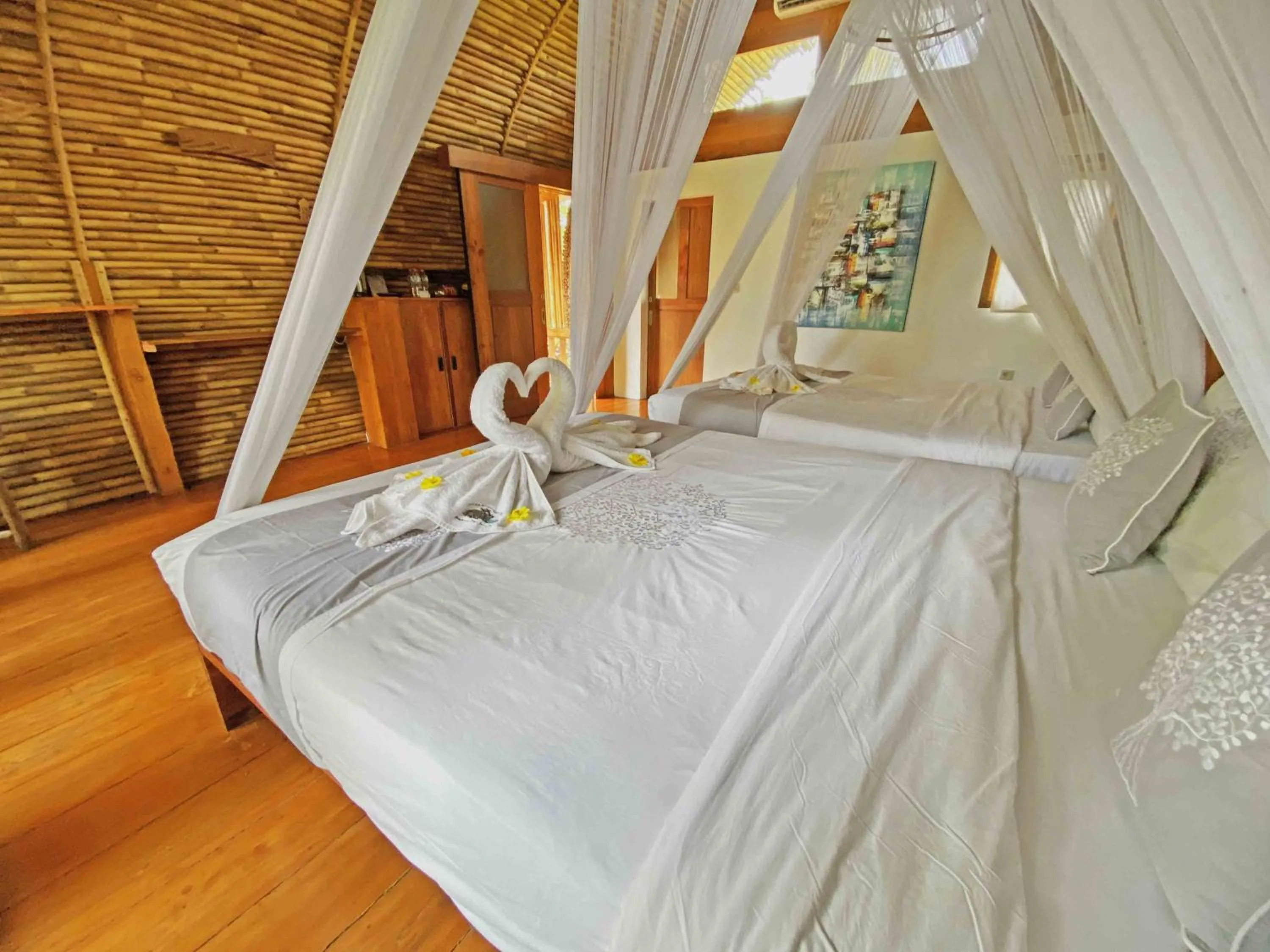 Bedroom, Bed in Lagoona Beach Bungalows - Eco Bungalows Batukaras