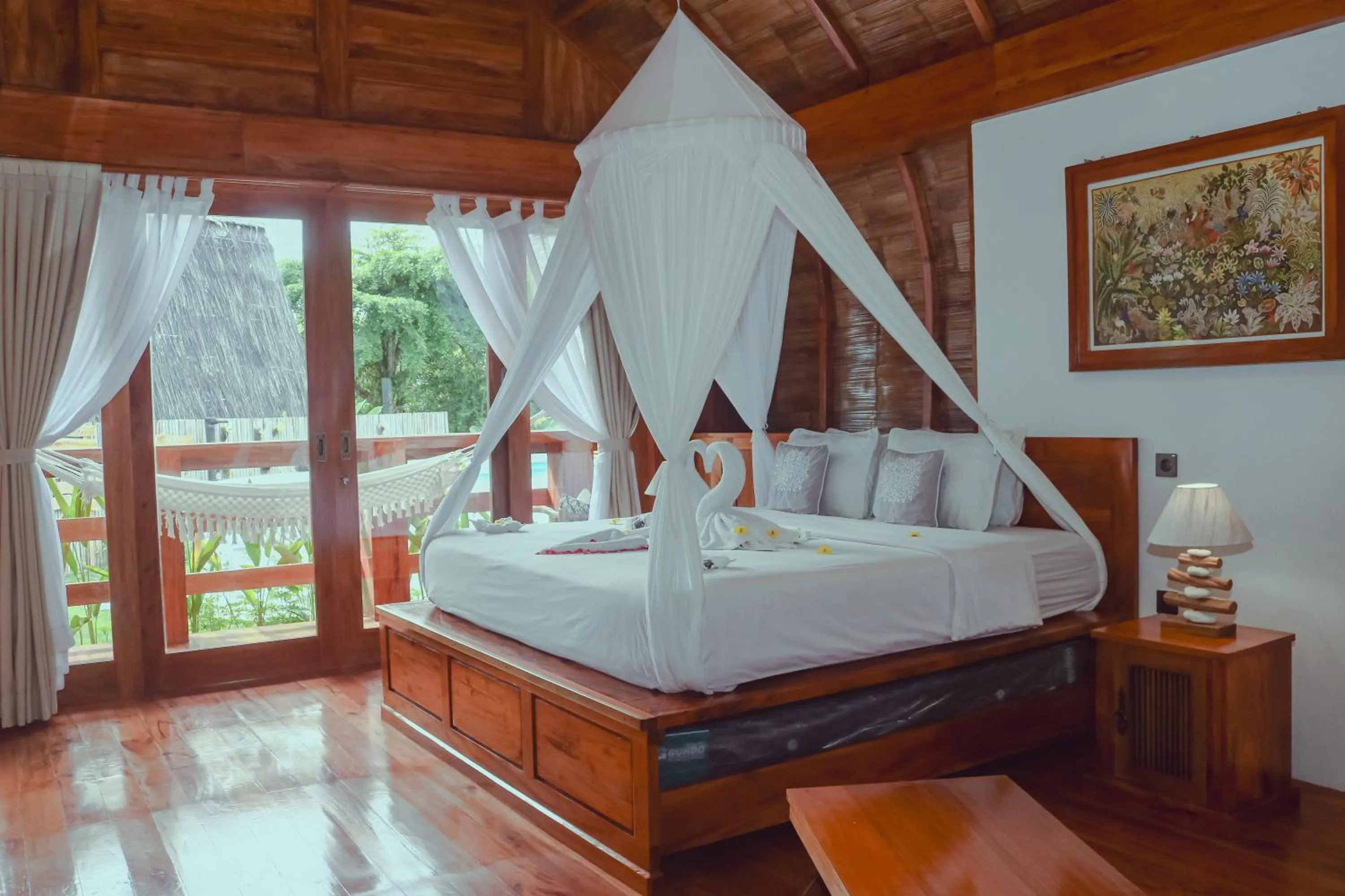 Bedroom, Bed in Lagoona Beach Bungalows - Eco Bungalows Batukaras