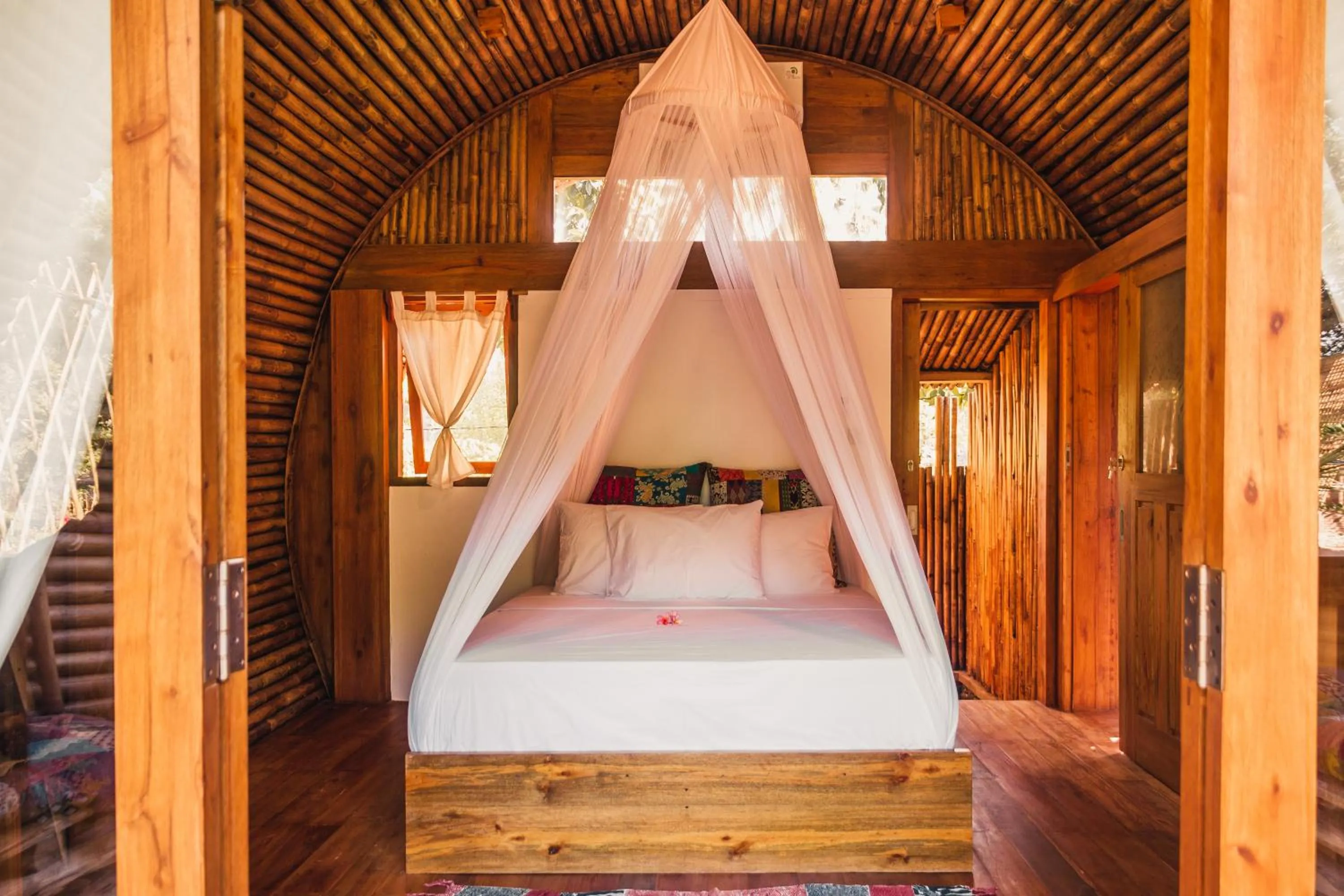 Bed in Lagoona Beach Bungalows - Eco Bungalows Batukaras