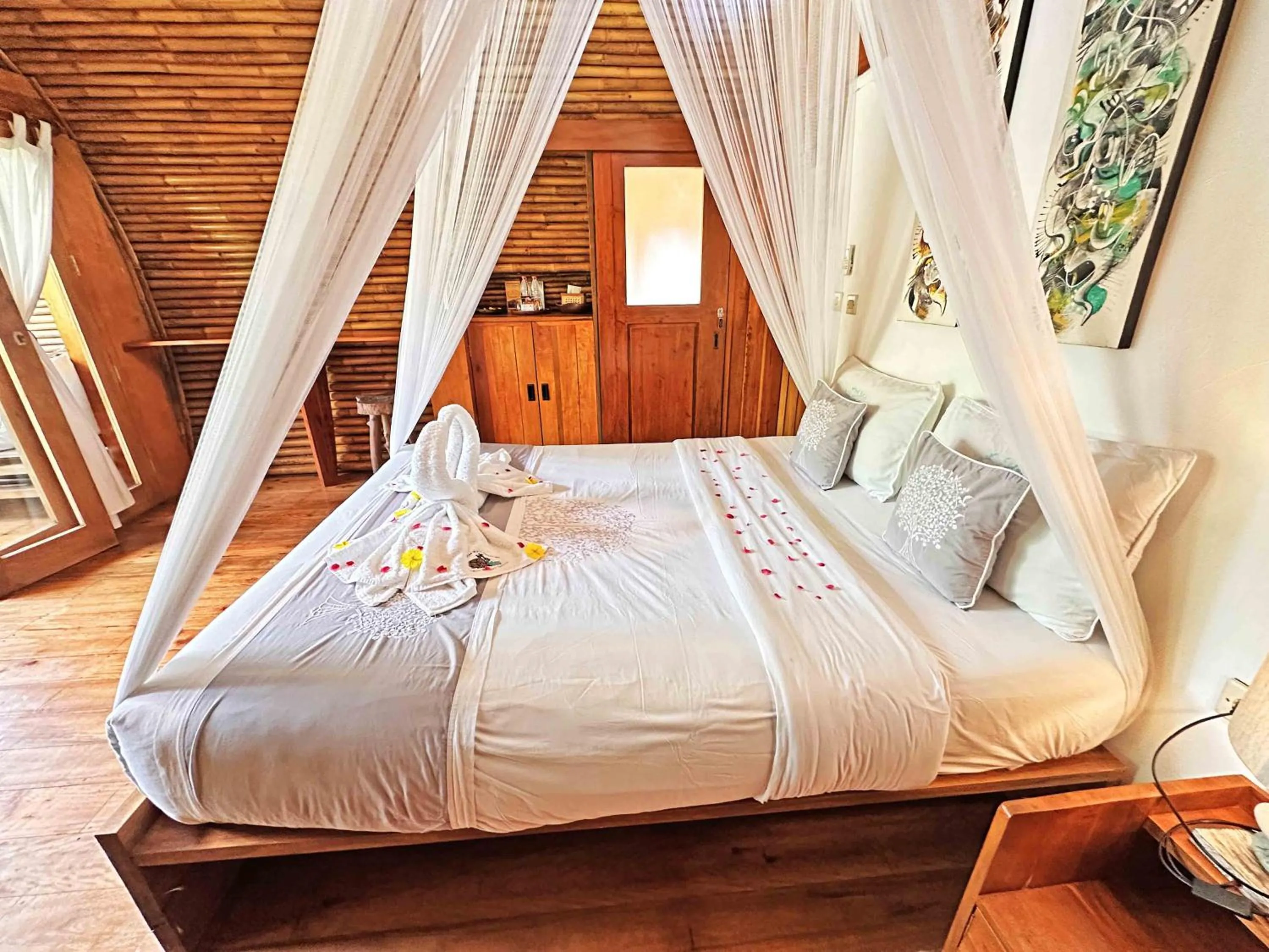 Bed in Lagoona Beach Bungalows - Eco Bungalows Batukaras
