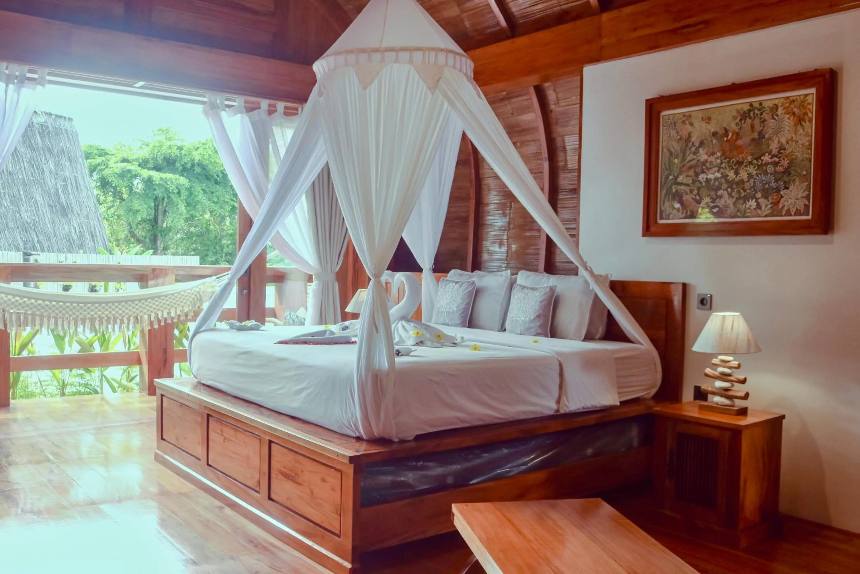 Bed in Lagoona Beach Bungalows - Eco Bungalows Batukaras