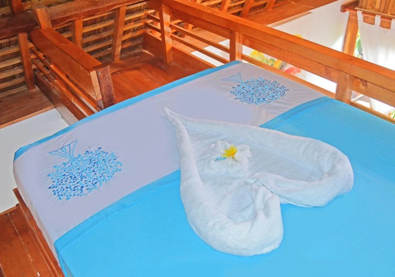 Bed in Lagoona Beach Bungalows - Eco Bungalows Batukaras