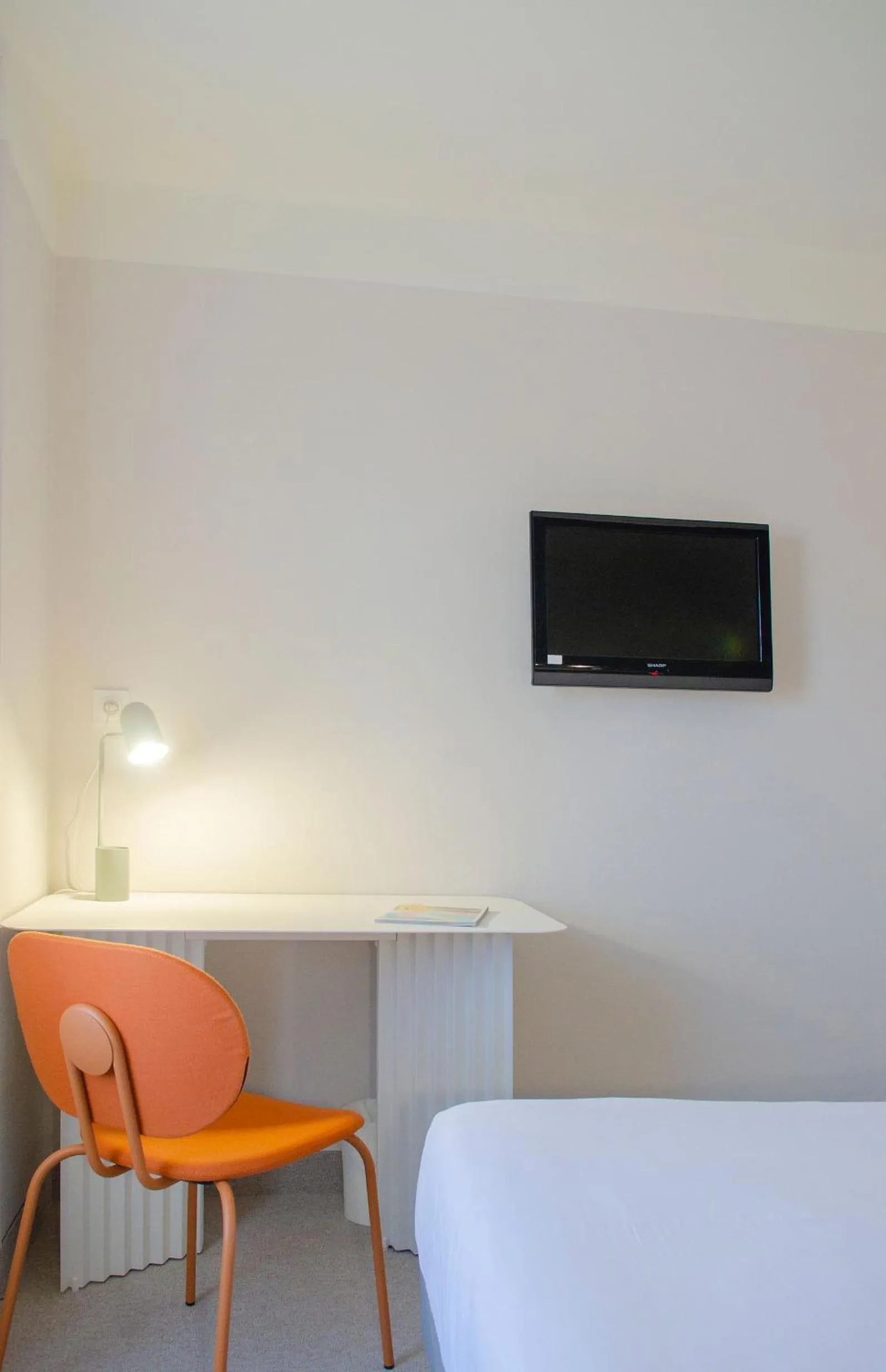Seating area, Bed in Hôtel IMPERATOR Béziers