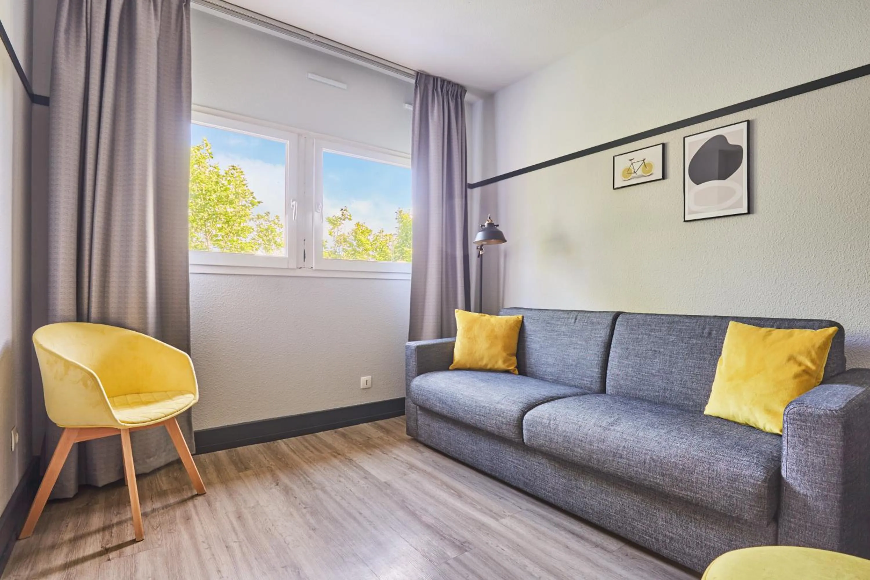 Seating area in Appart Hotel Odalys City Aix en Provence L'Atrium