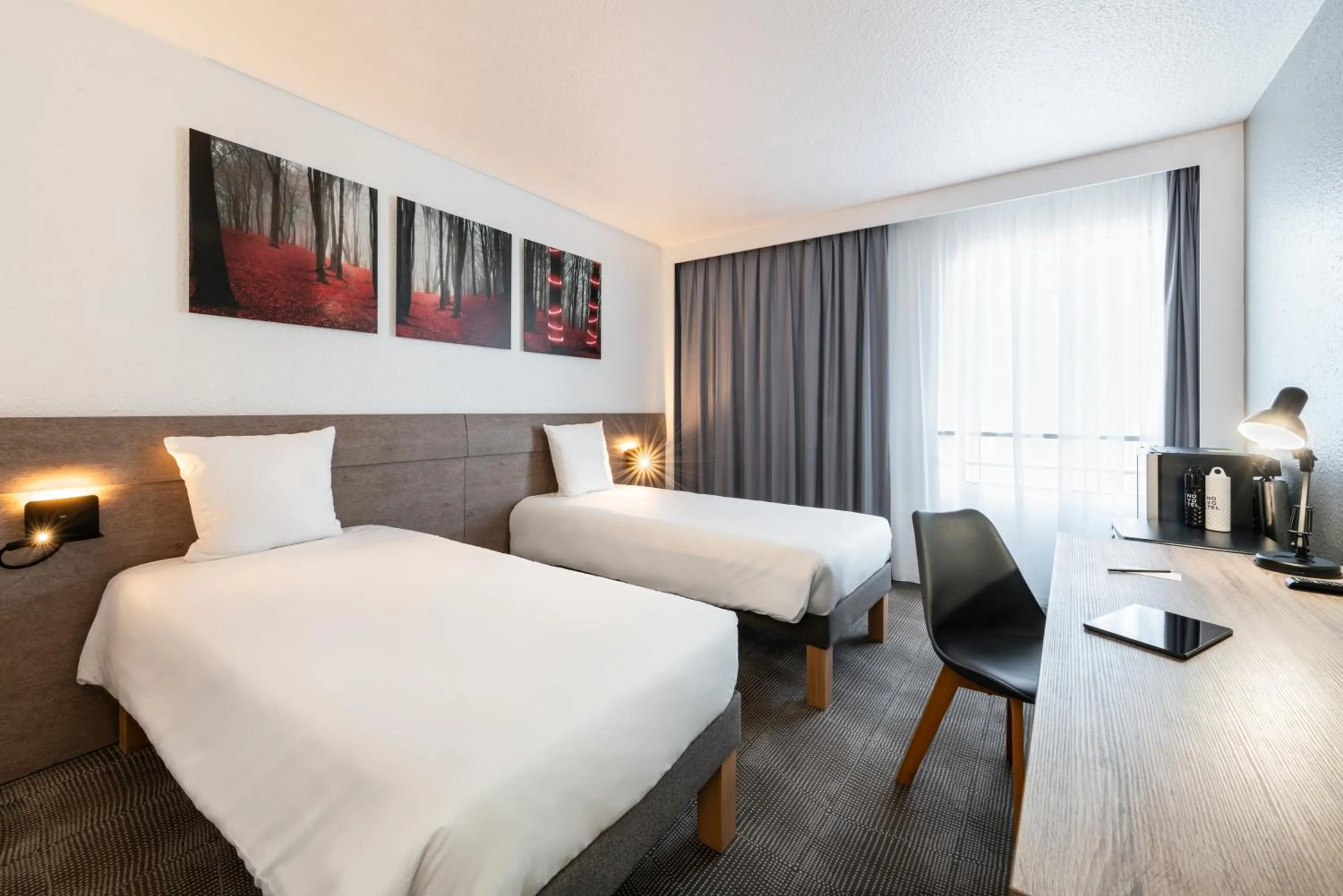 Photo of the whole room, Bed in Novotel Paris Est