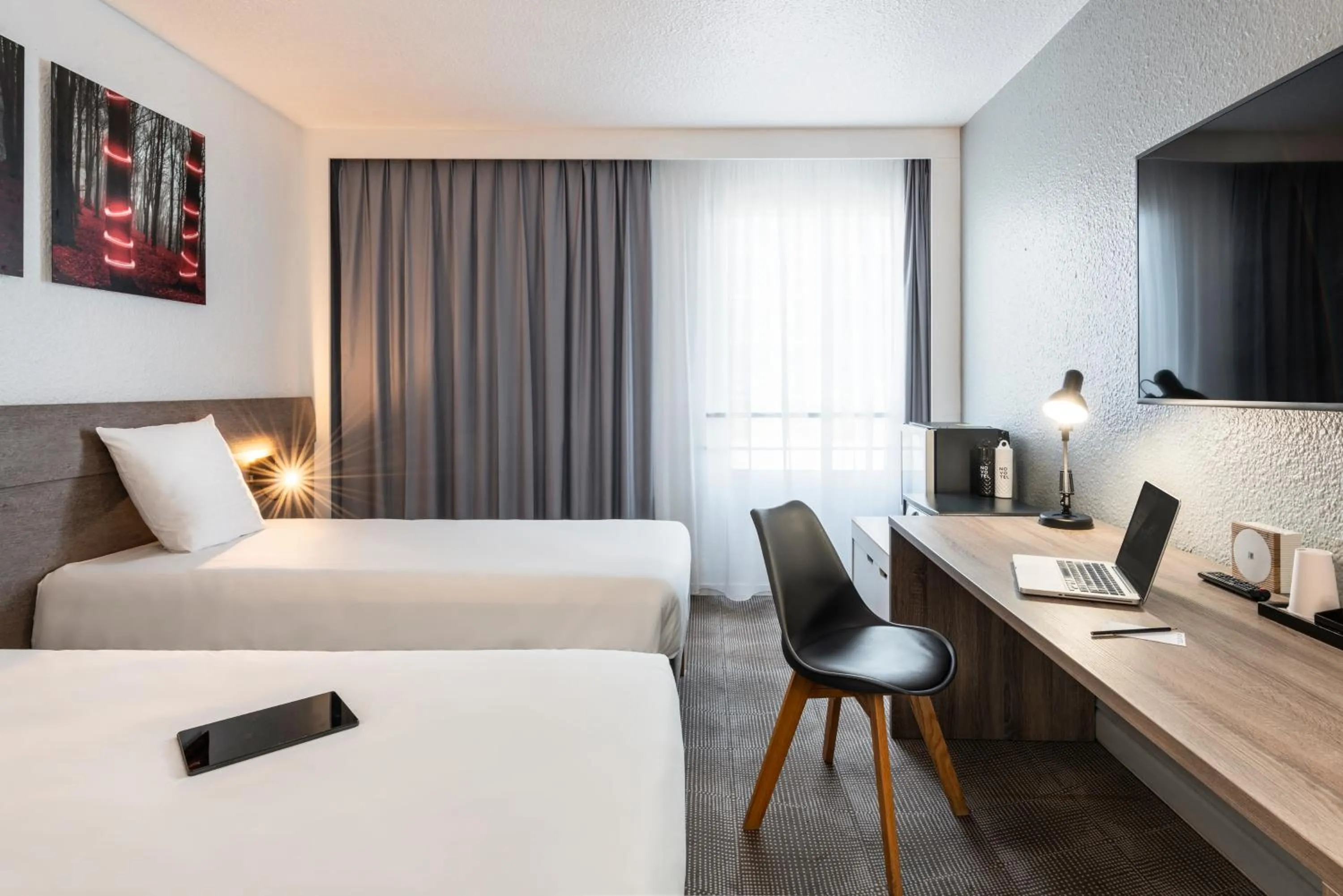 Photo of the whole room, Bed in Novotel Paris Est