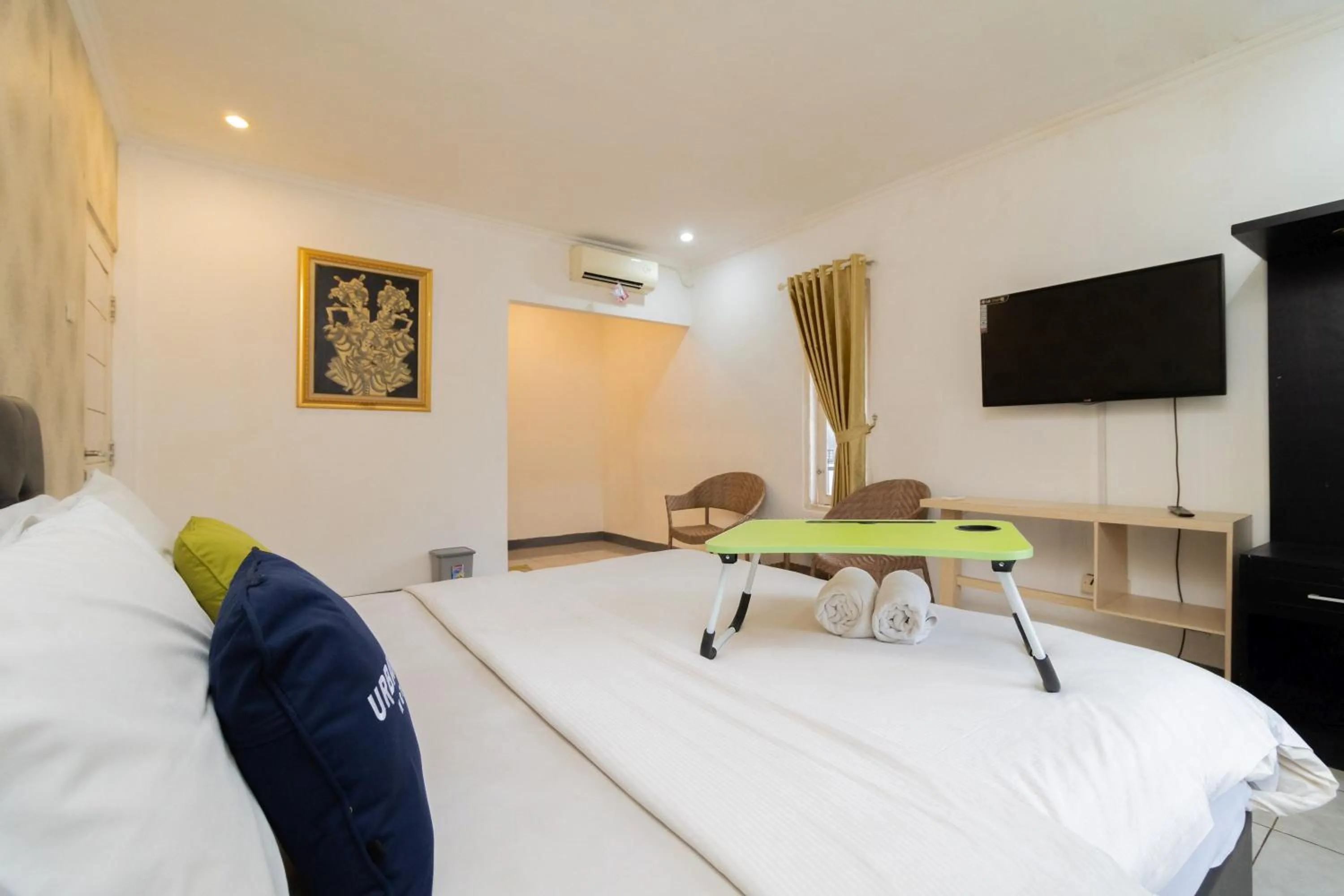 Bedroom, Bed in Urbanview Hotel Gunung Geulis Village by RedDoorz