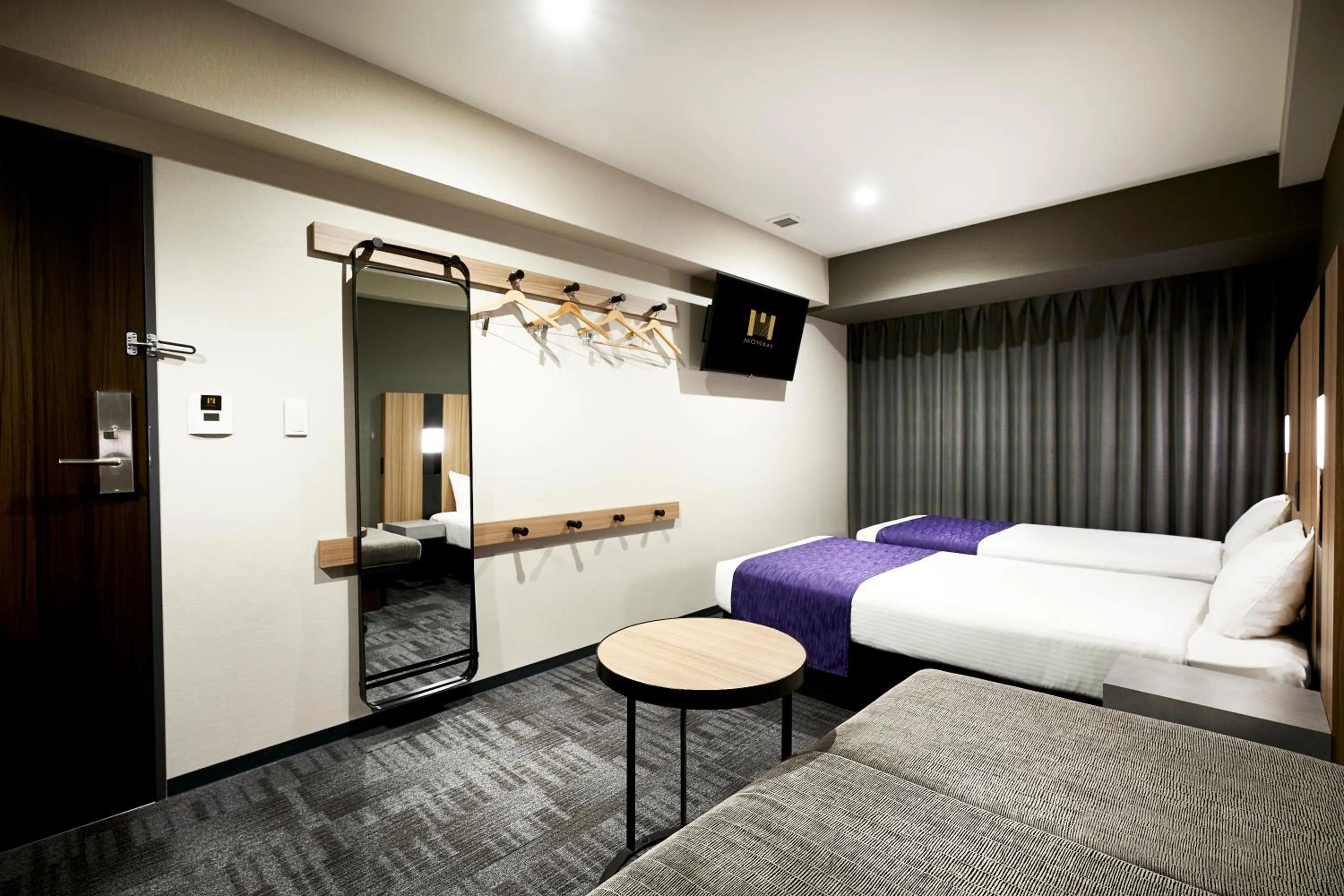 Bed in hotel MONday Kyoto Karasuma Nijo