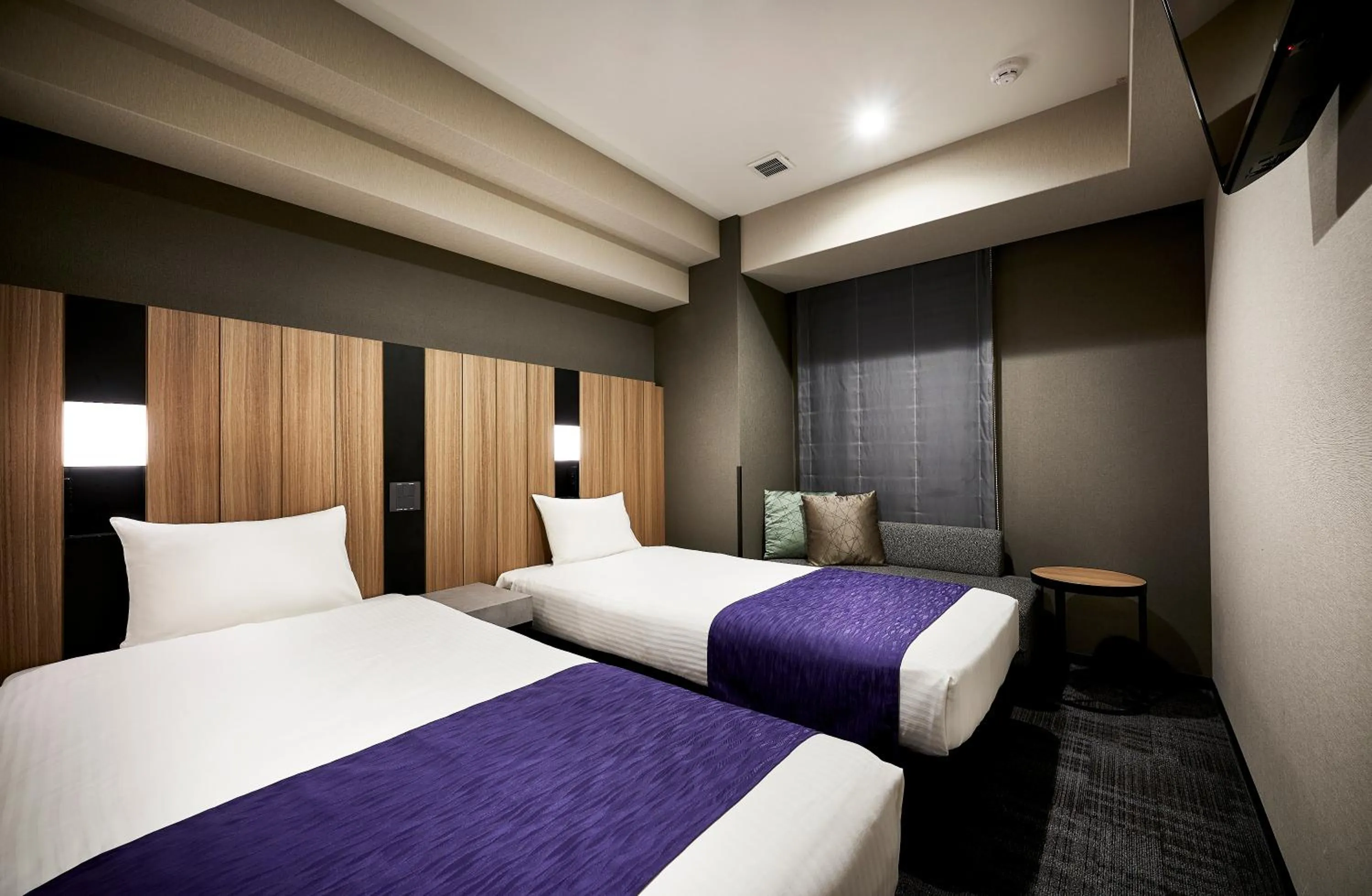 Bed in hotel MONday Kyoto Karasuma Nijo