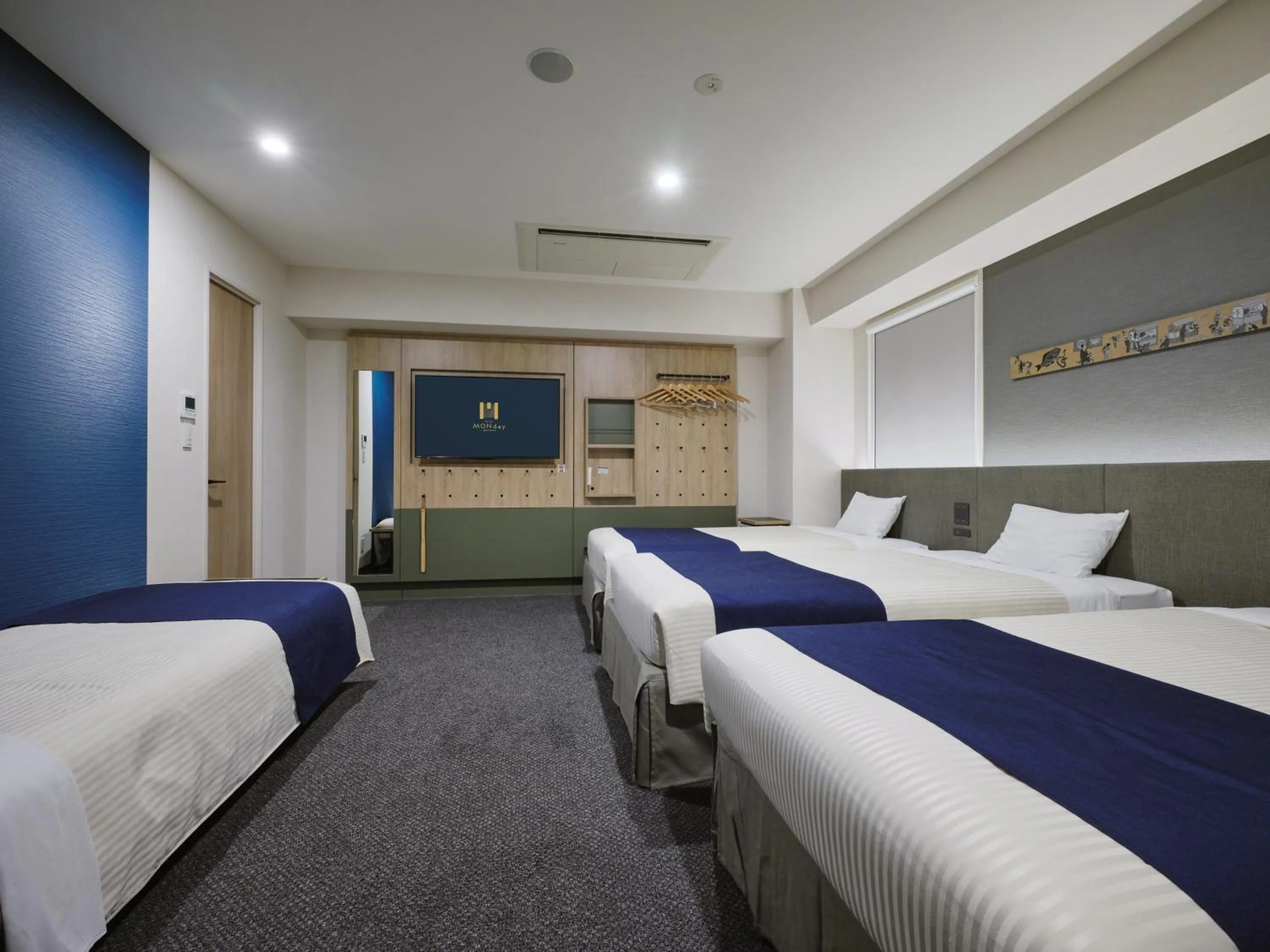 Bed in hotel MONday Premium Ueno Okachimachi