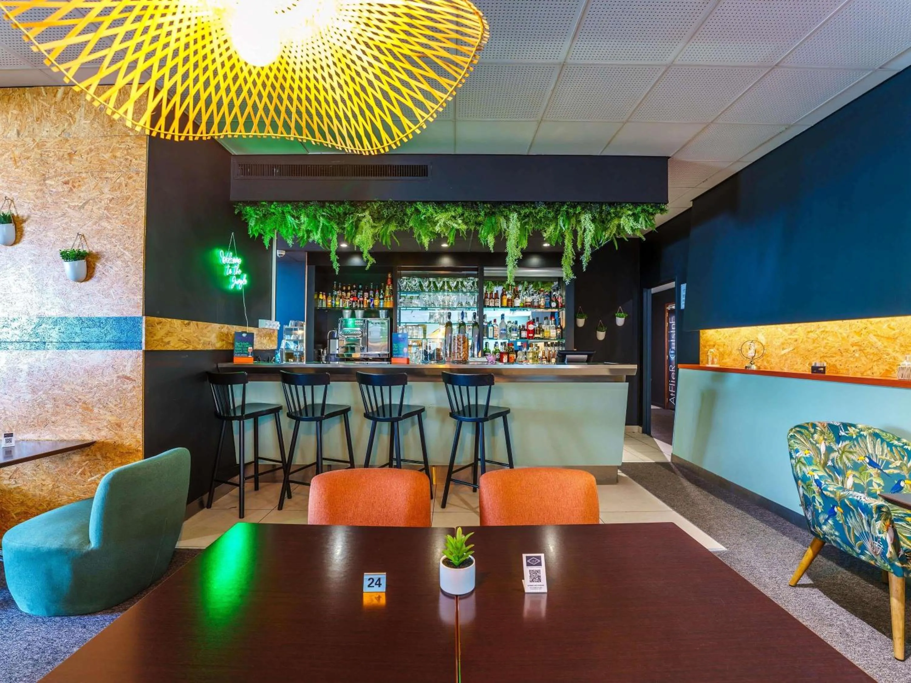 Lounge or bar in Novotel Mulhouse Bâle Fribourg