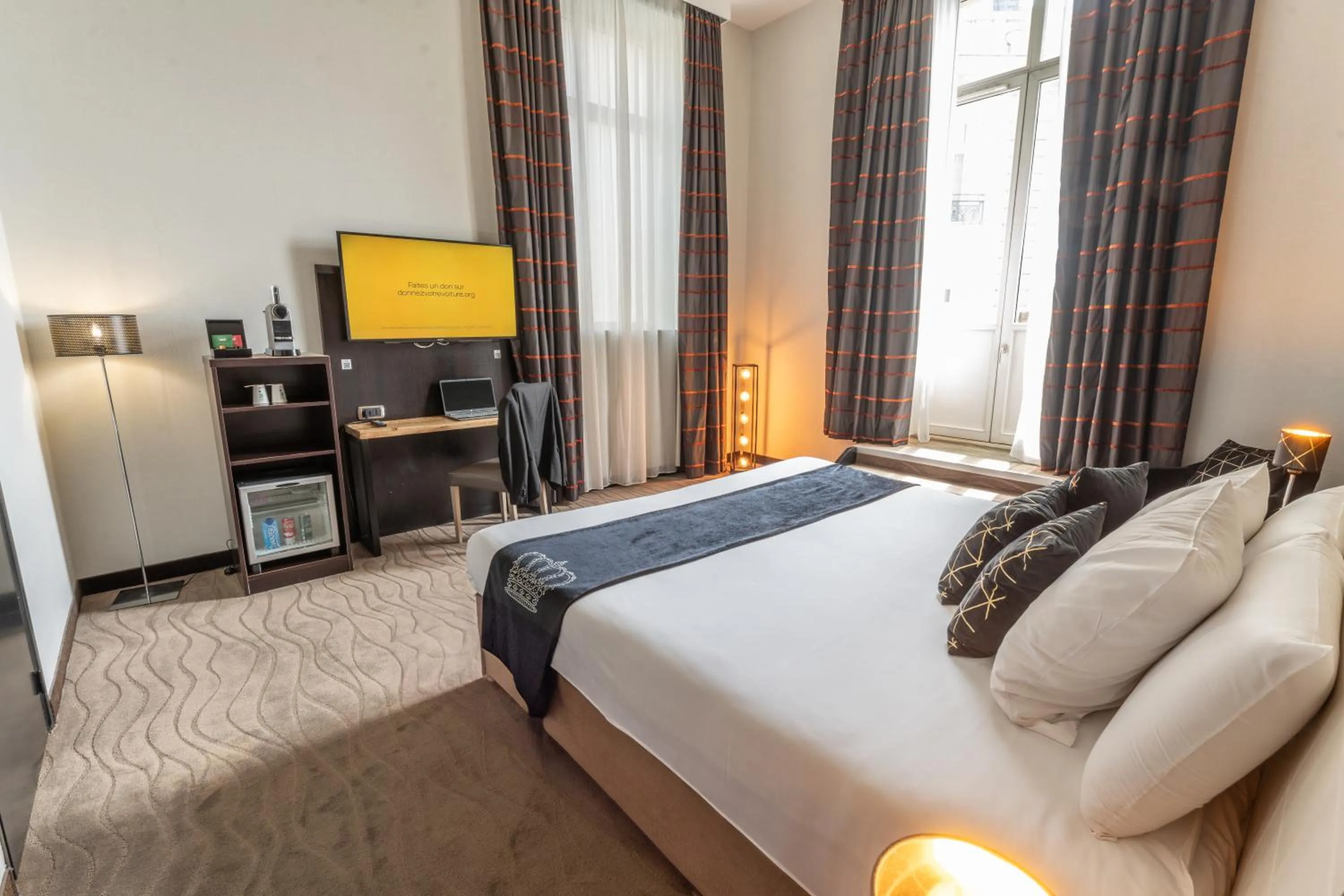 Photo of the whole room, Bed in Mercure Le Mans Centre