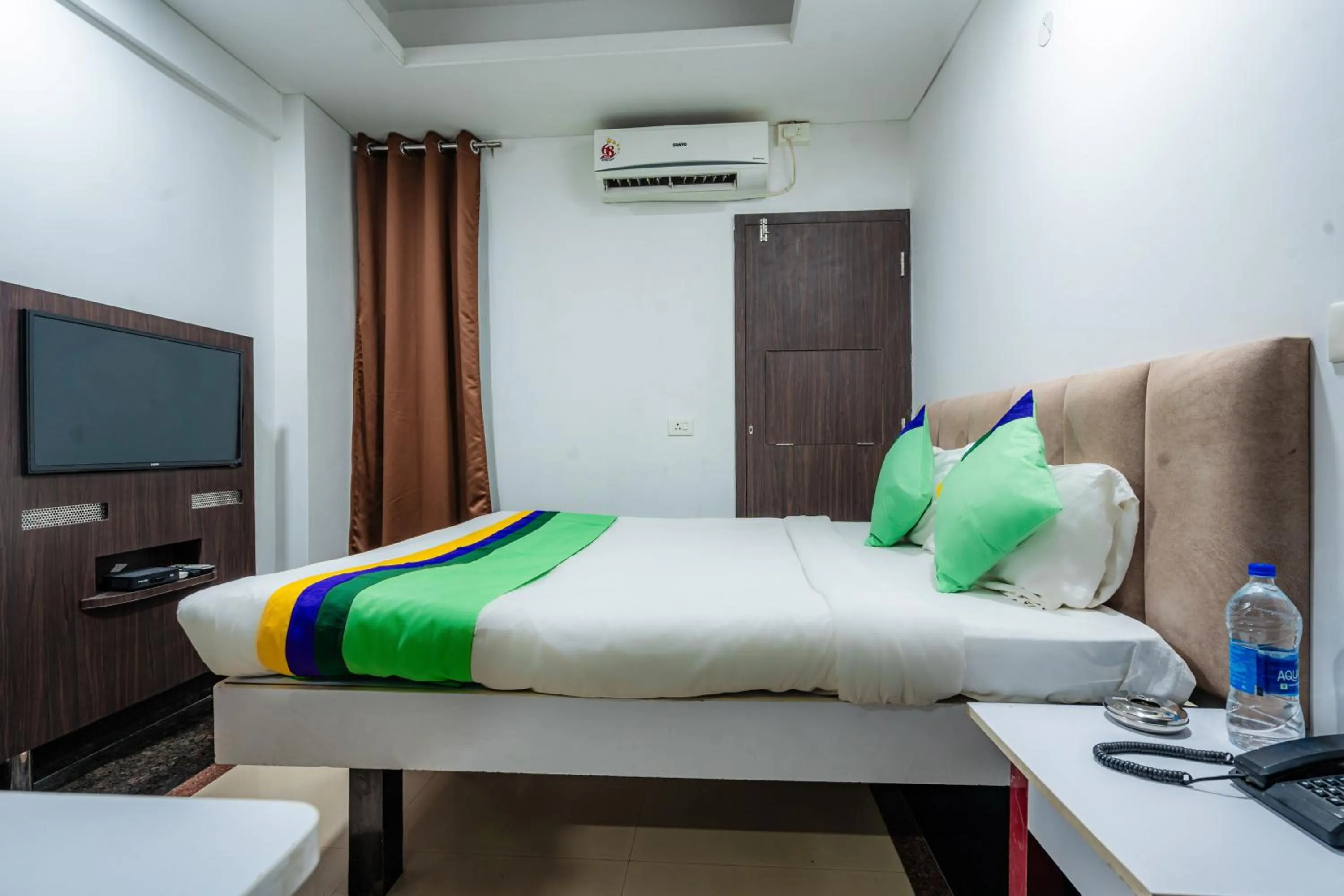 Bedroom, Bed in Treebo Silver Apartment