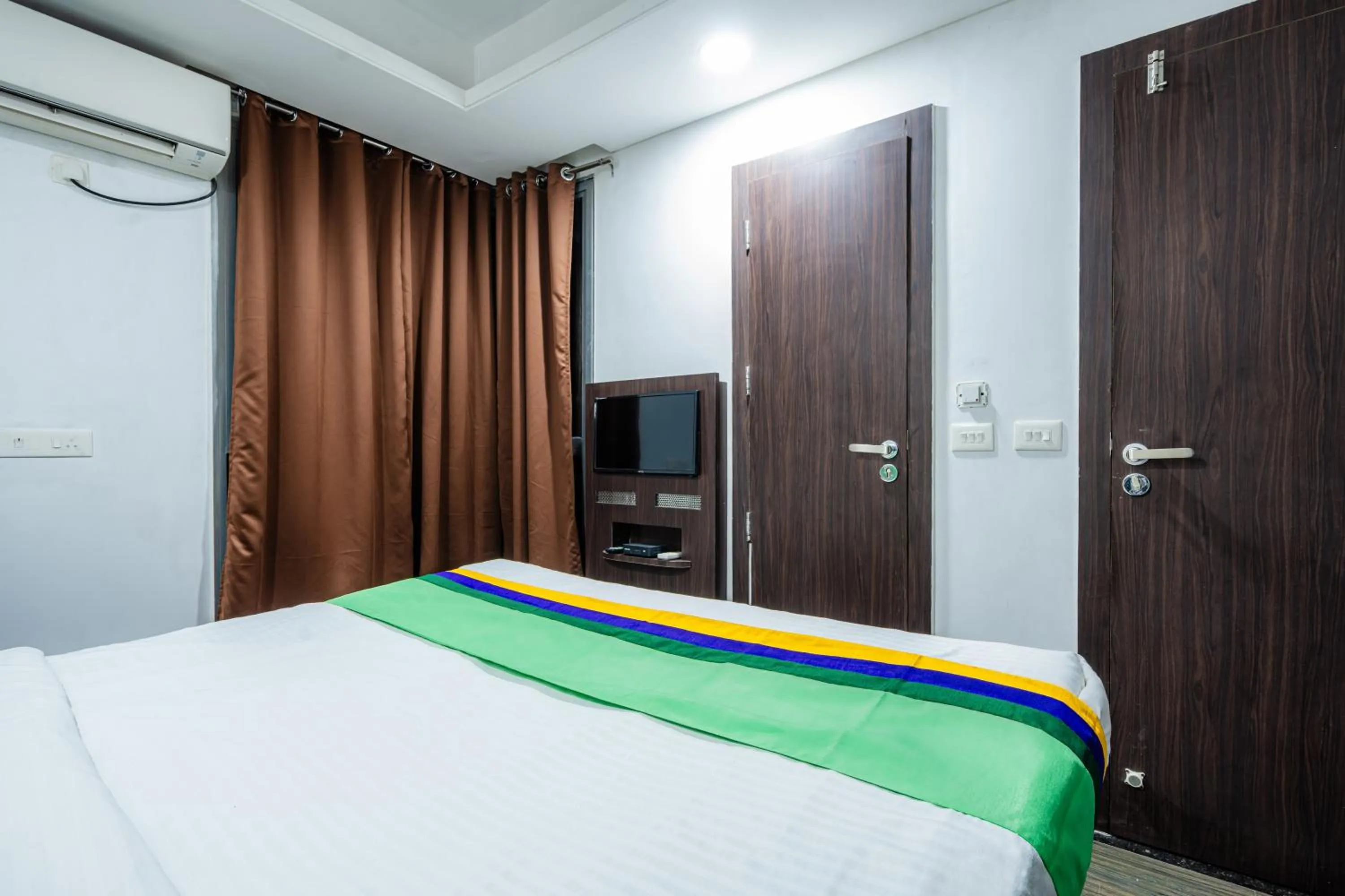 Bedroom, Bed in Treebo Silver Apartment