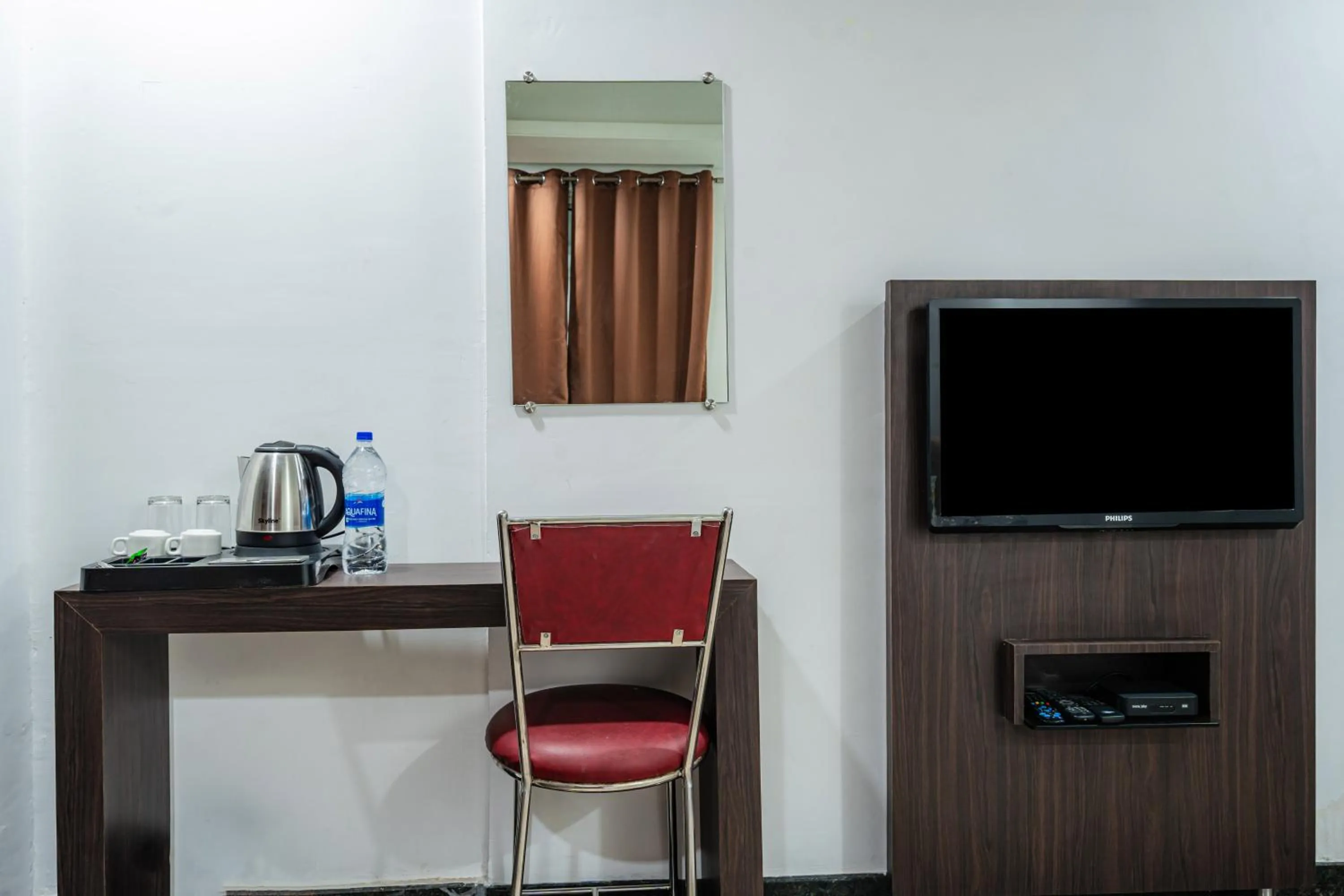 TV and multimedia in Treebo Silver Apartment