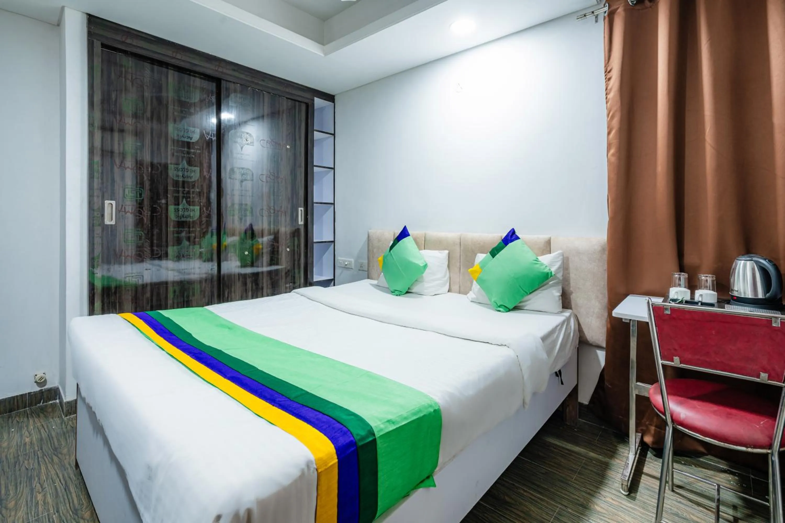 Bedroom, Bed in Treebo Silver Apartment