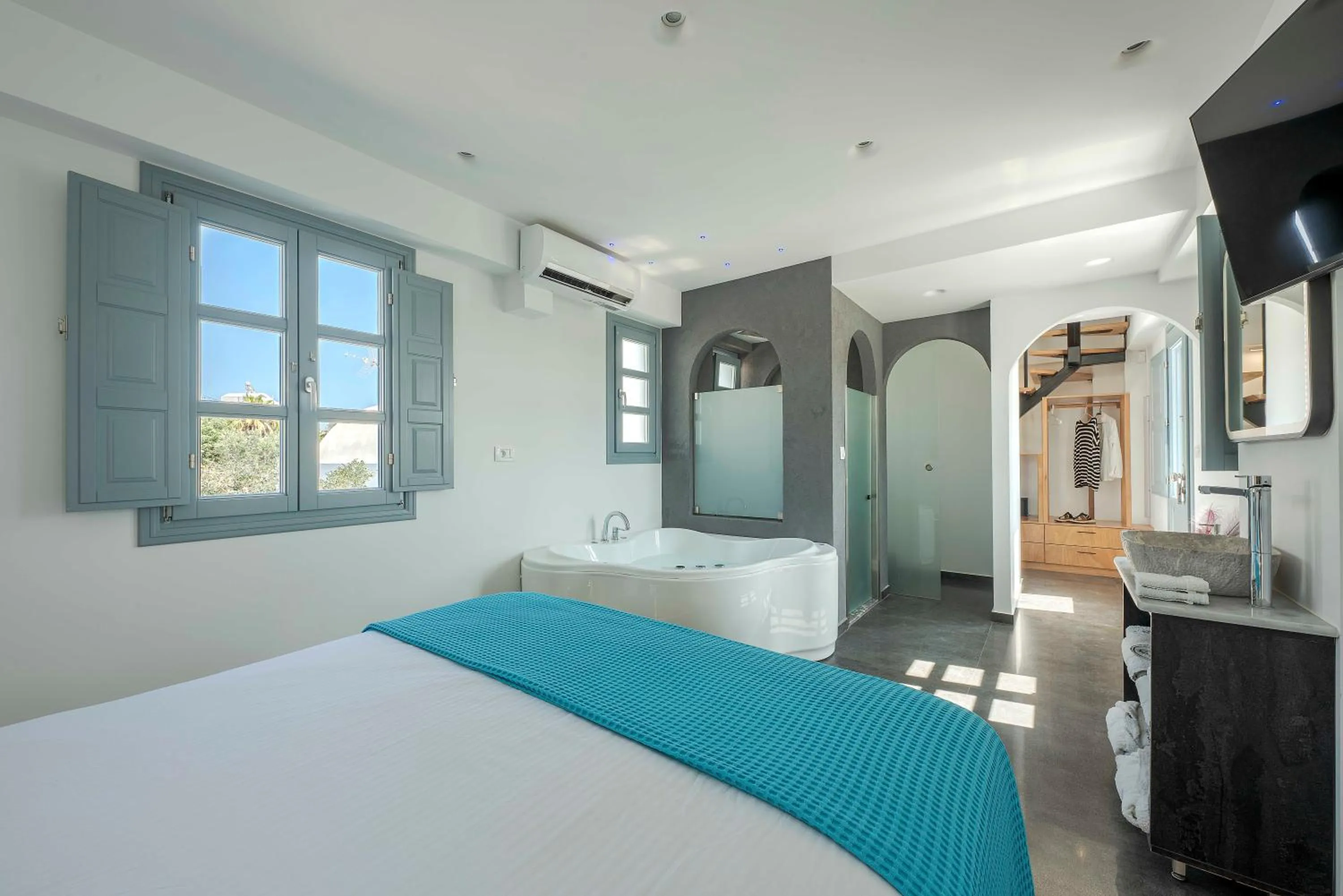 Bed in BlackStone Luxury Suites