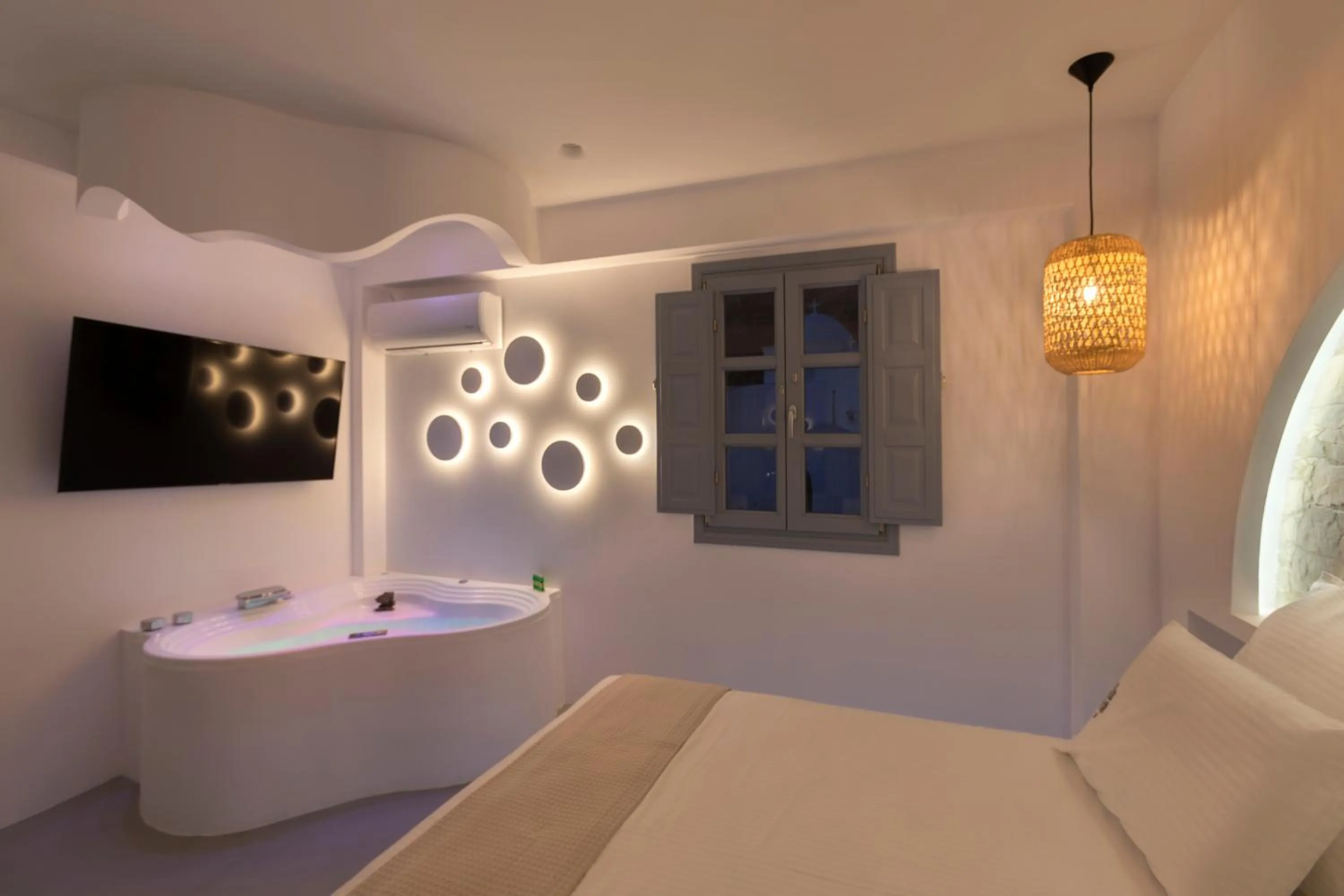 Bed in BlackStone Luxury Suites