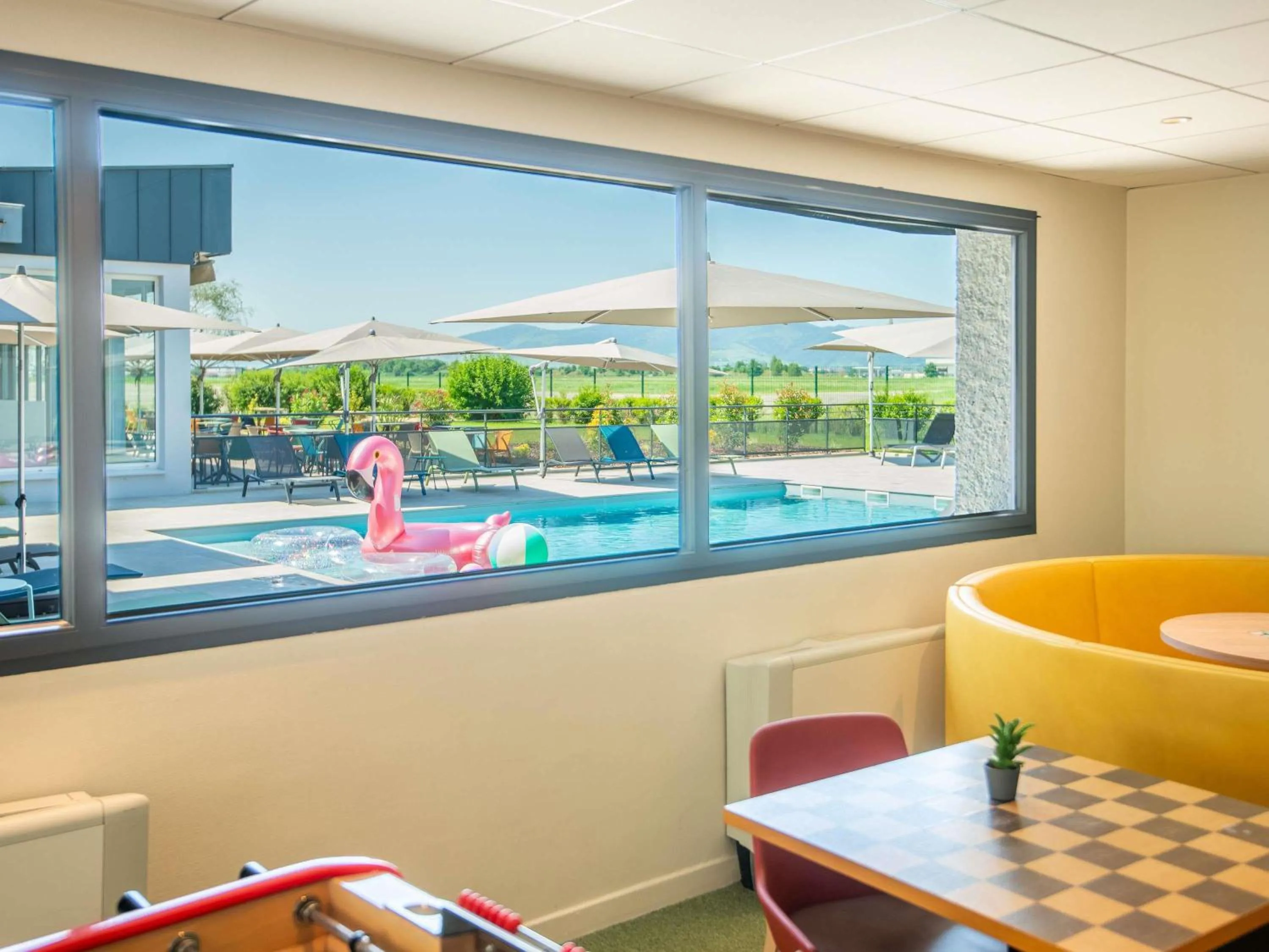 Pool view in Ibis Styles Colmar Nord