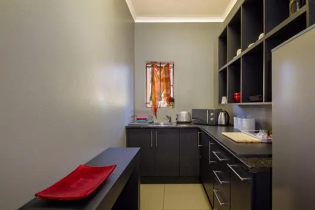 Kitchen or kitchenette in The Minimalist Studio B