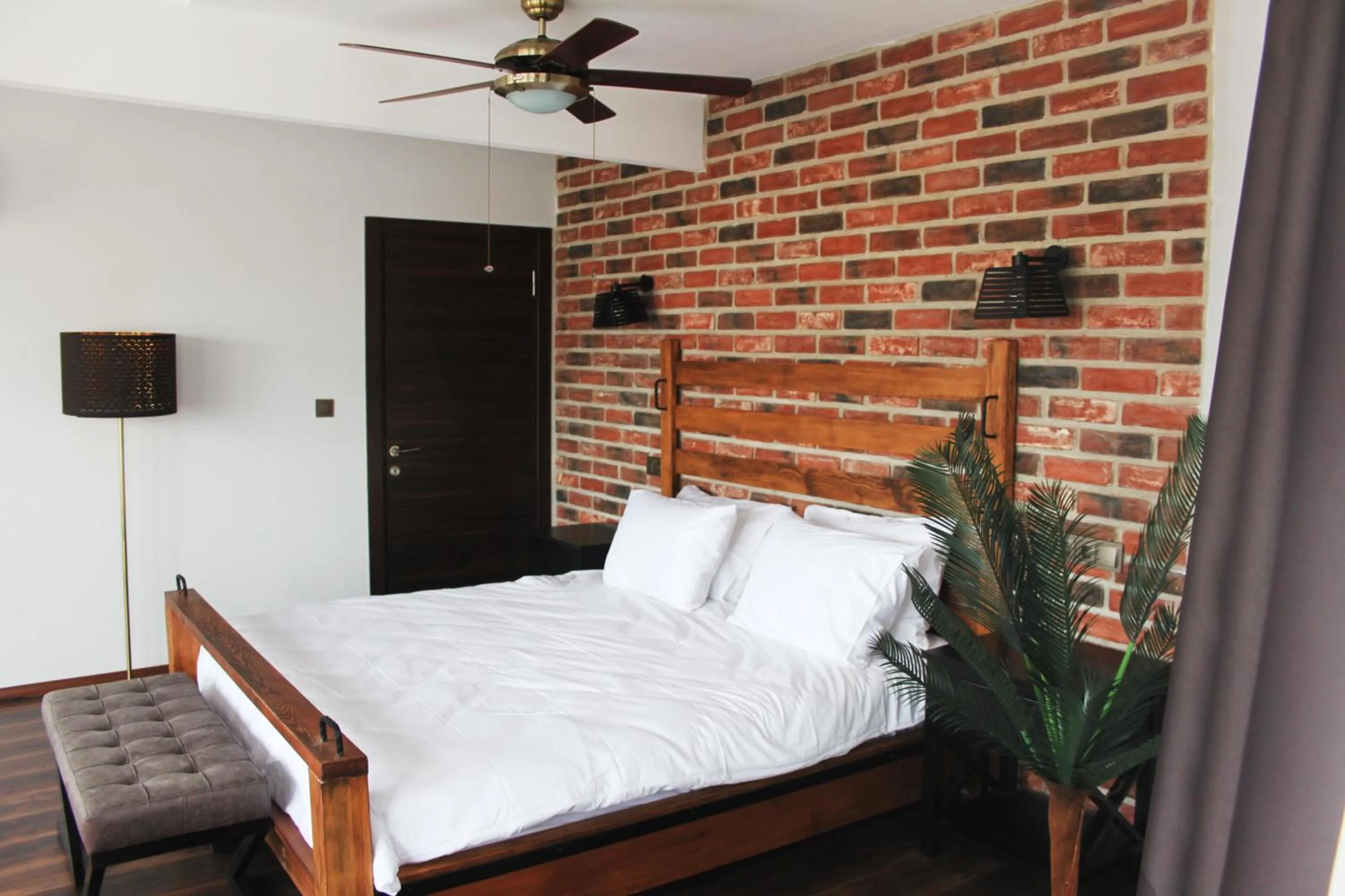 Bedroom, Bed in Fuego Design Suites