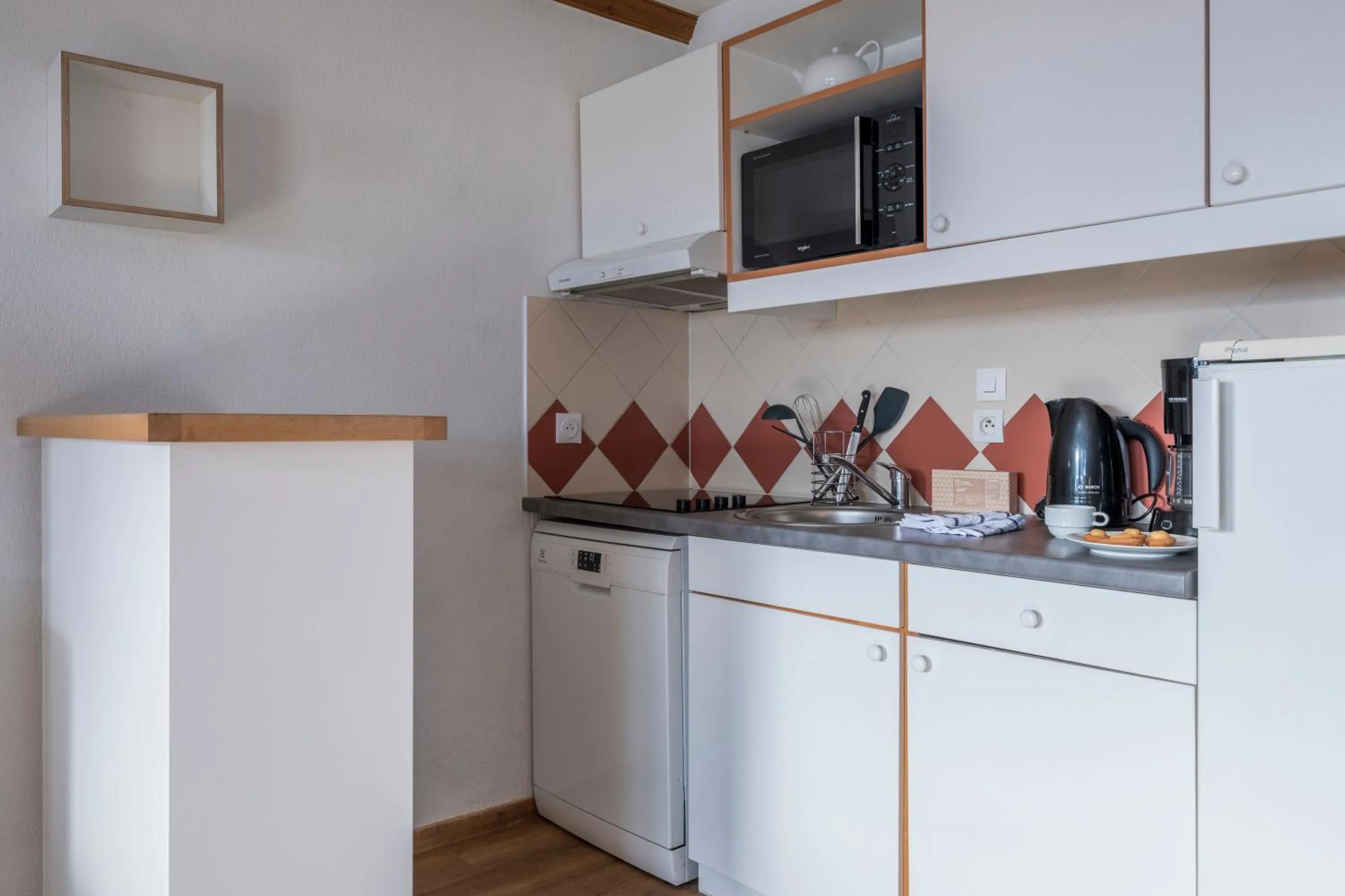 Kitchen or kitchenette in Résidence Pierre & Vacances La Rivière