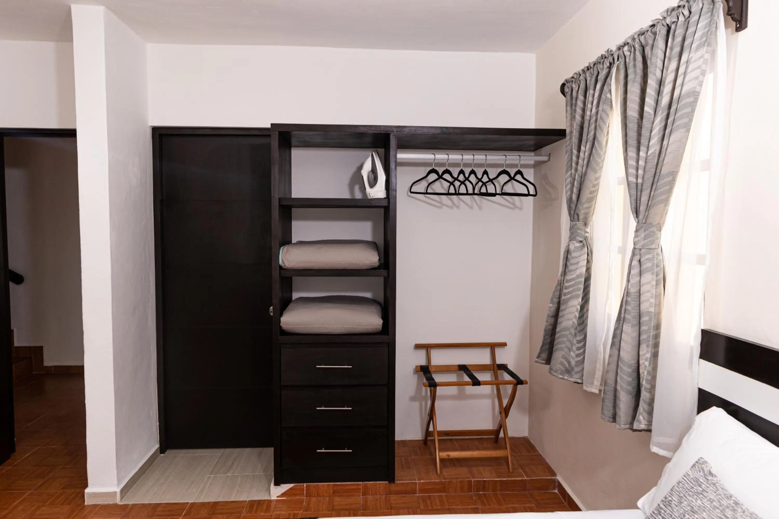 wardrobe in Santa Fe Studios And Suites