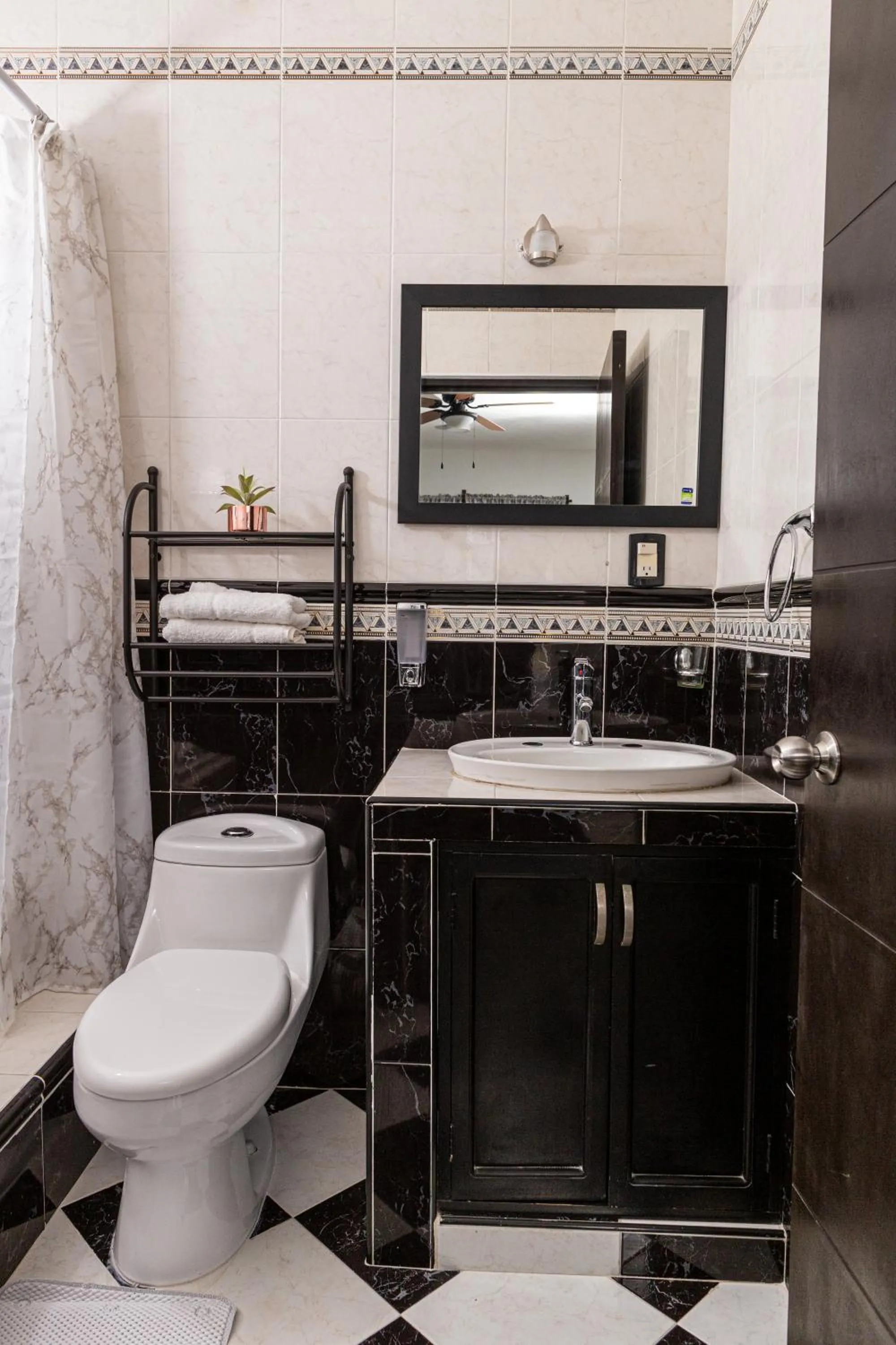Bathroom in Santa Fe Studios And Suites
